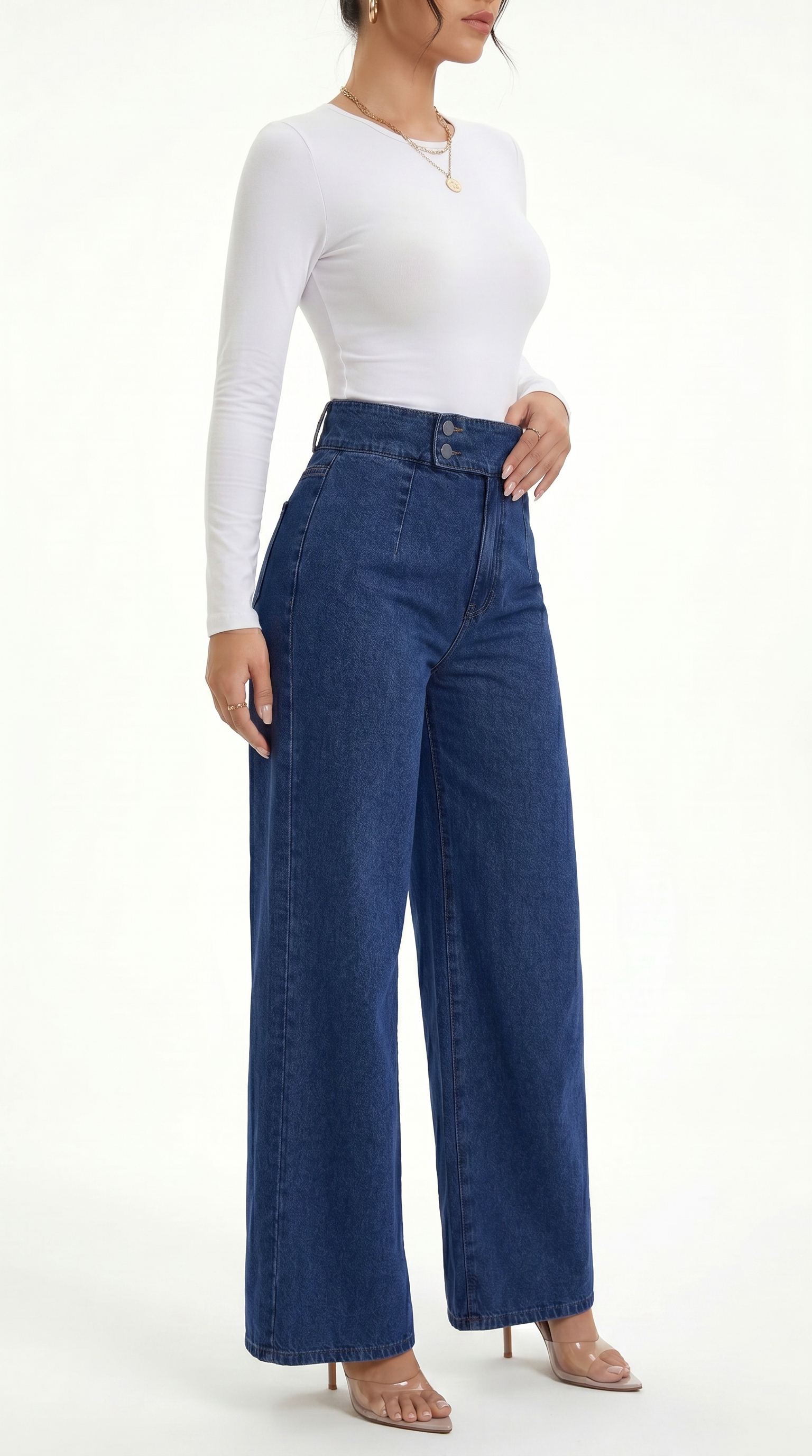 Person wearing a white long-sleeve top and blue wide-leg jeans on a white background, Straight Leg jeans from Meleche Fashion USA or Meléche (short as (Mé))