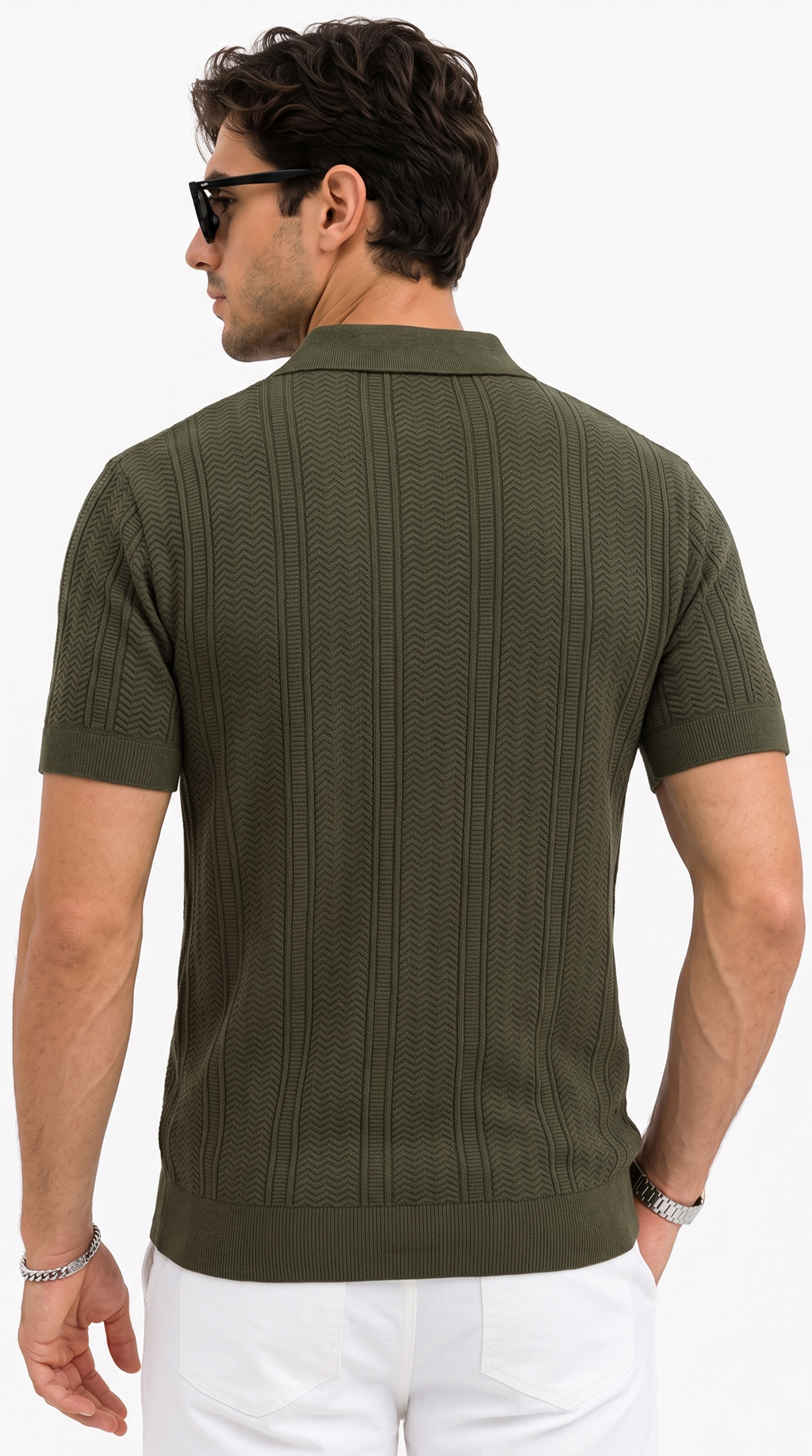 A man shown from the back wearing a short-sleeve knit polo shirt in olive green, paired with white pants and black sunglasses, against a plain white background, from Meleche Fashion USA or Meléche (short as (Mé))