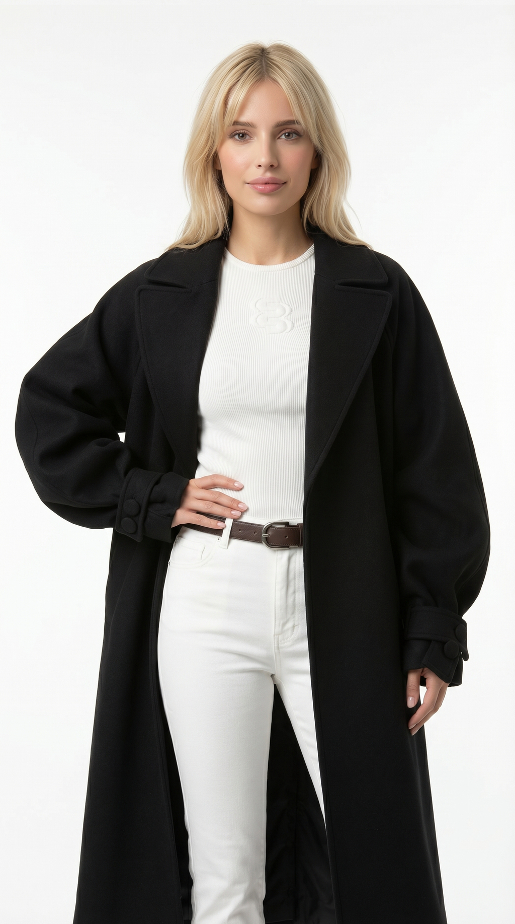 Woman wearing a black coat over a white outfit on a white background from Meleche USA or Meléche (short as (Mé))
