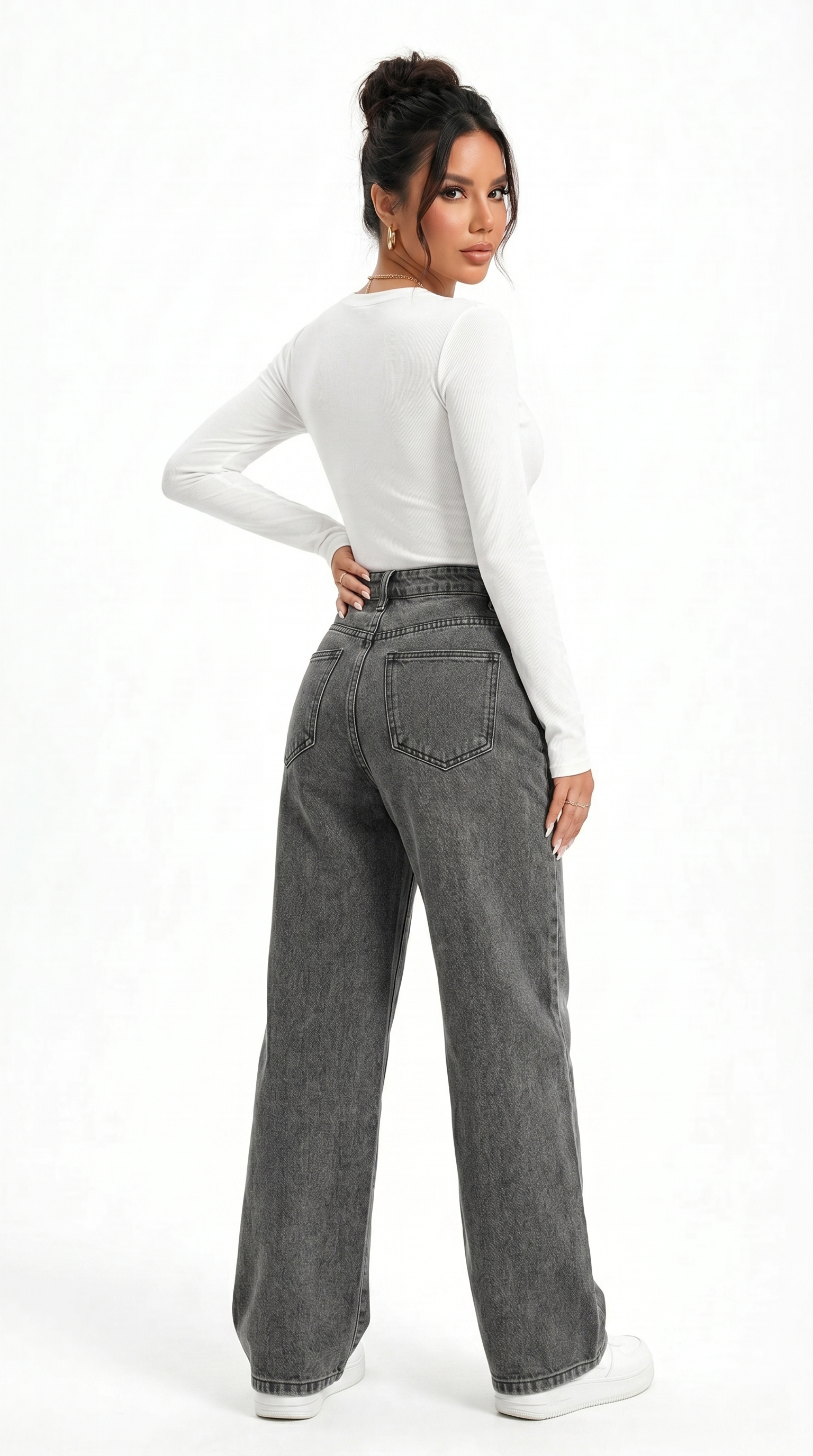 Woman wearing gray high-waisted jeans and a white long-sleeve top on a white background, Cotton jeans from Meleche Fashion USA or Meléche (short as (Mé))