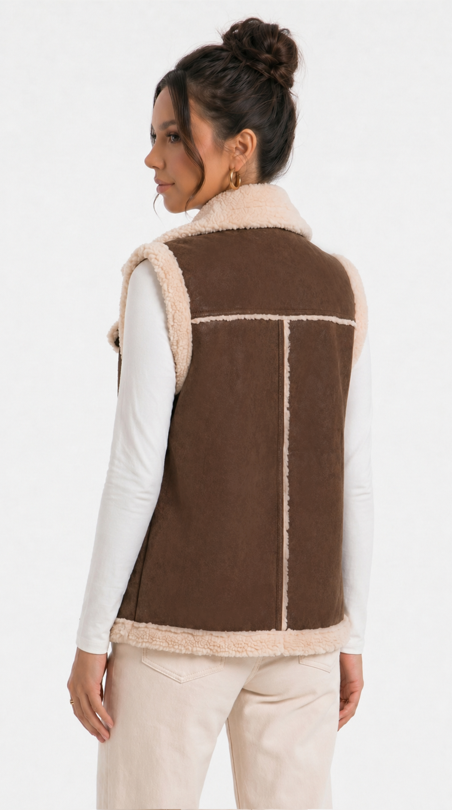 girl from back view wearing a brown  vest with a plain background from Meleche Fashion USA or Meléche (short as (Mé))