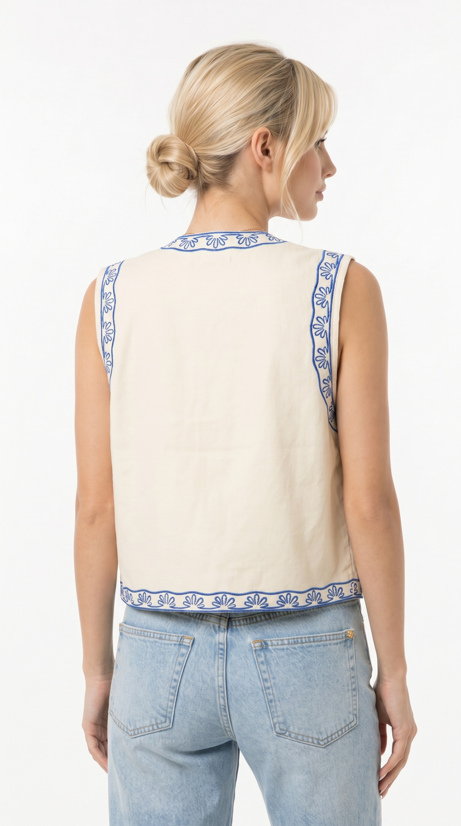 Woman wearing a beige fur vest on a white background from Meleche Fashion USA or Meléche (short as (Mé))