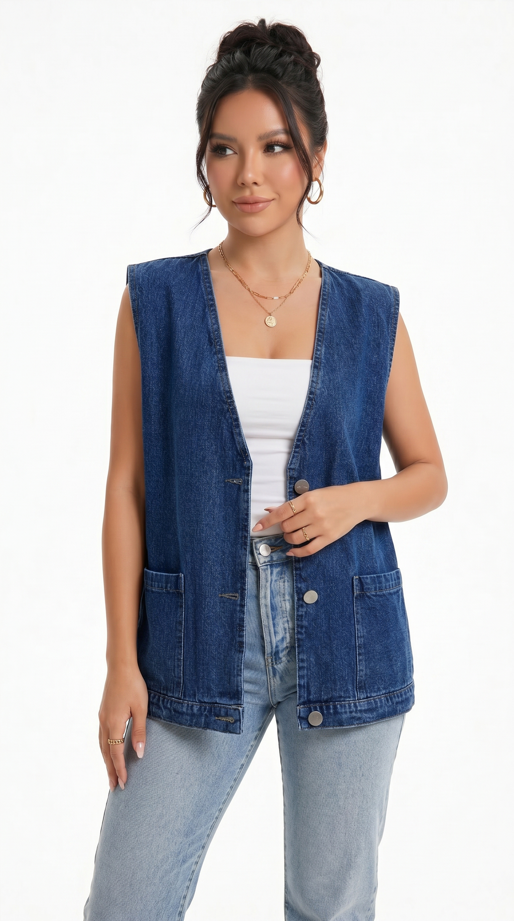 Woman wearing a blue denim vest over a white top and light blue jeans on a white background from Meleche Fashion USA or Meléche (short as (Mé))