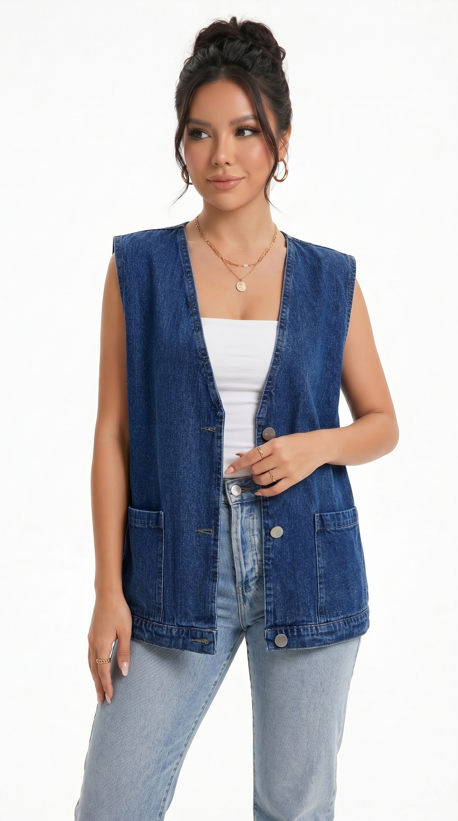 Woman wearing a blue denim vest over a white top and light blue jeans on a white background from Meleche Fashion USA or Meléche (short as (Mé))