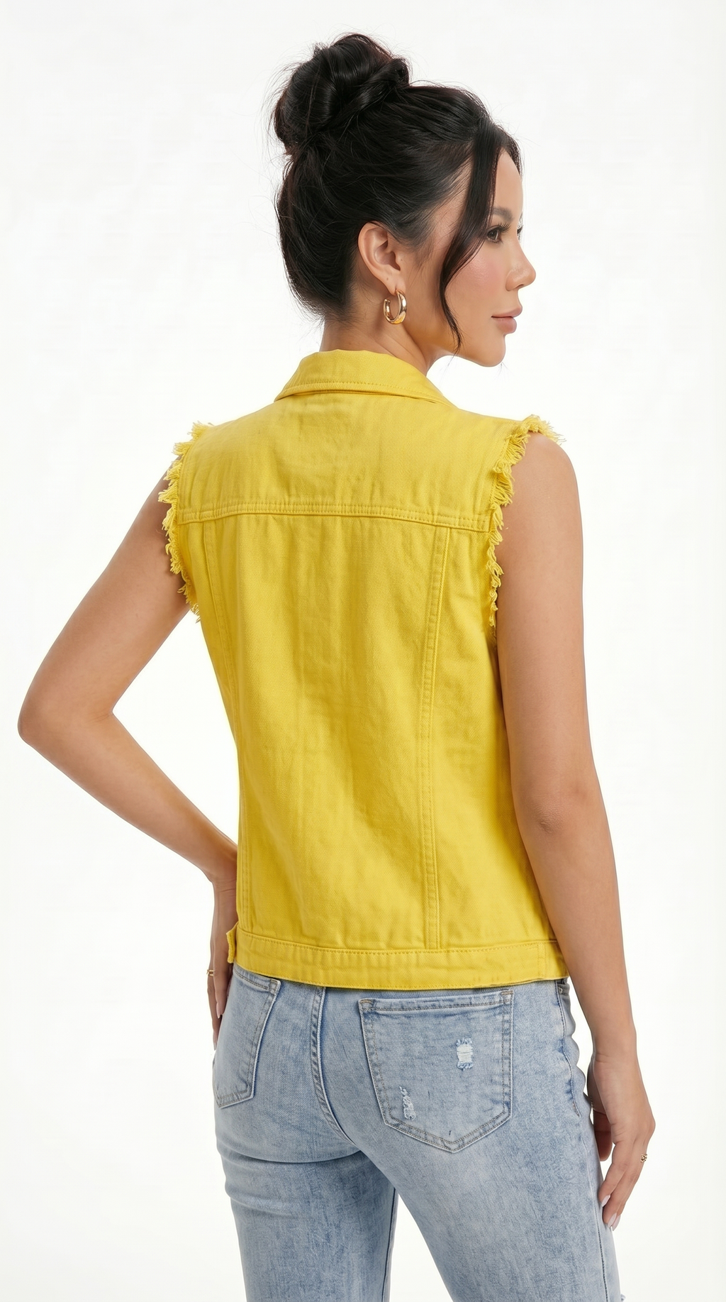 Woman wearing a yellow denim vest and light blue jeans on a white background, from Meleche Fashion USA or Meléche (short as (Mé))