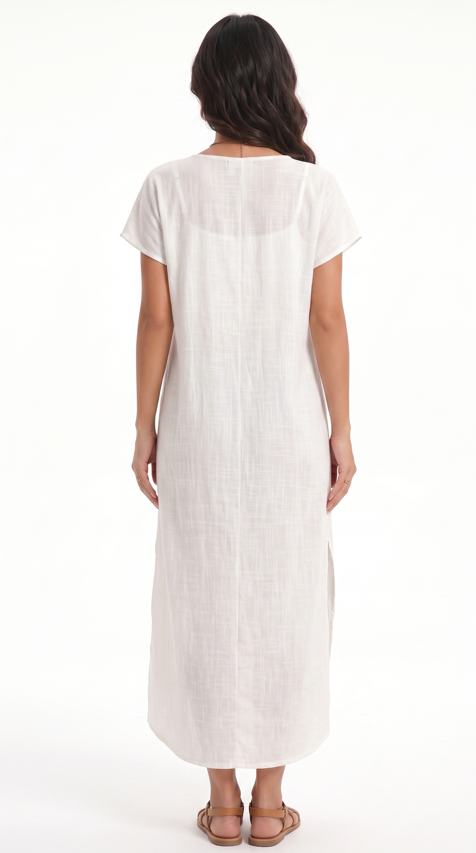 Woman wearing a white dress on a white background