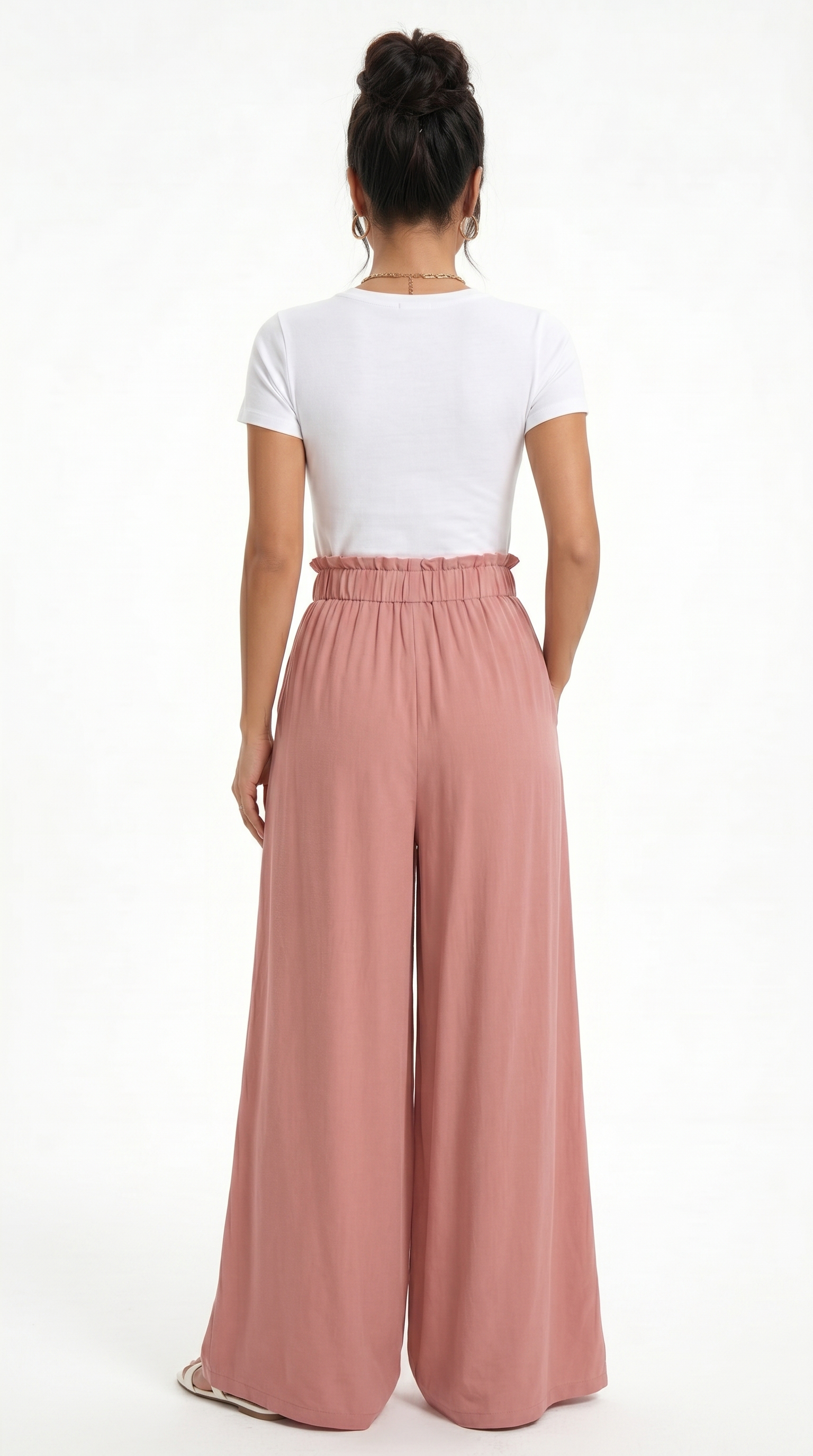 Person wearing a white top and pink wide-leg pants on a white background, sexy loss pants from Meleche Fashion USA or Meléche (short as (Mé))