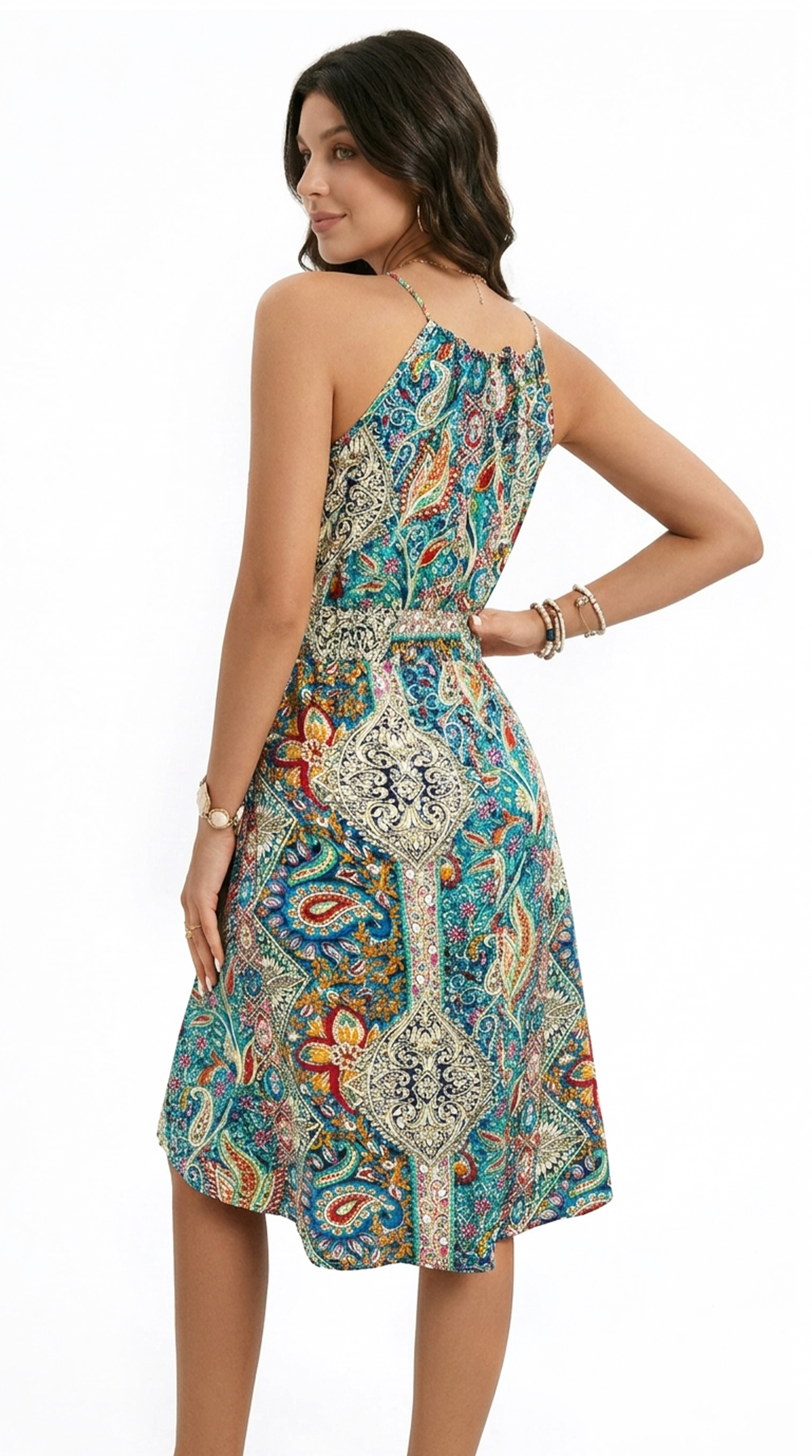 Woman wearing a colorful one-shoulder dress from Meleche or Meléche (short as (Mé))