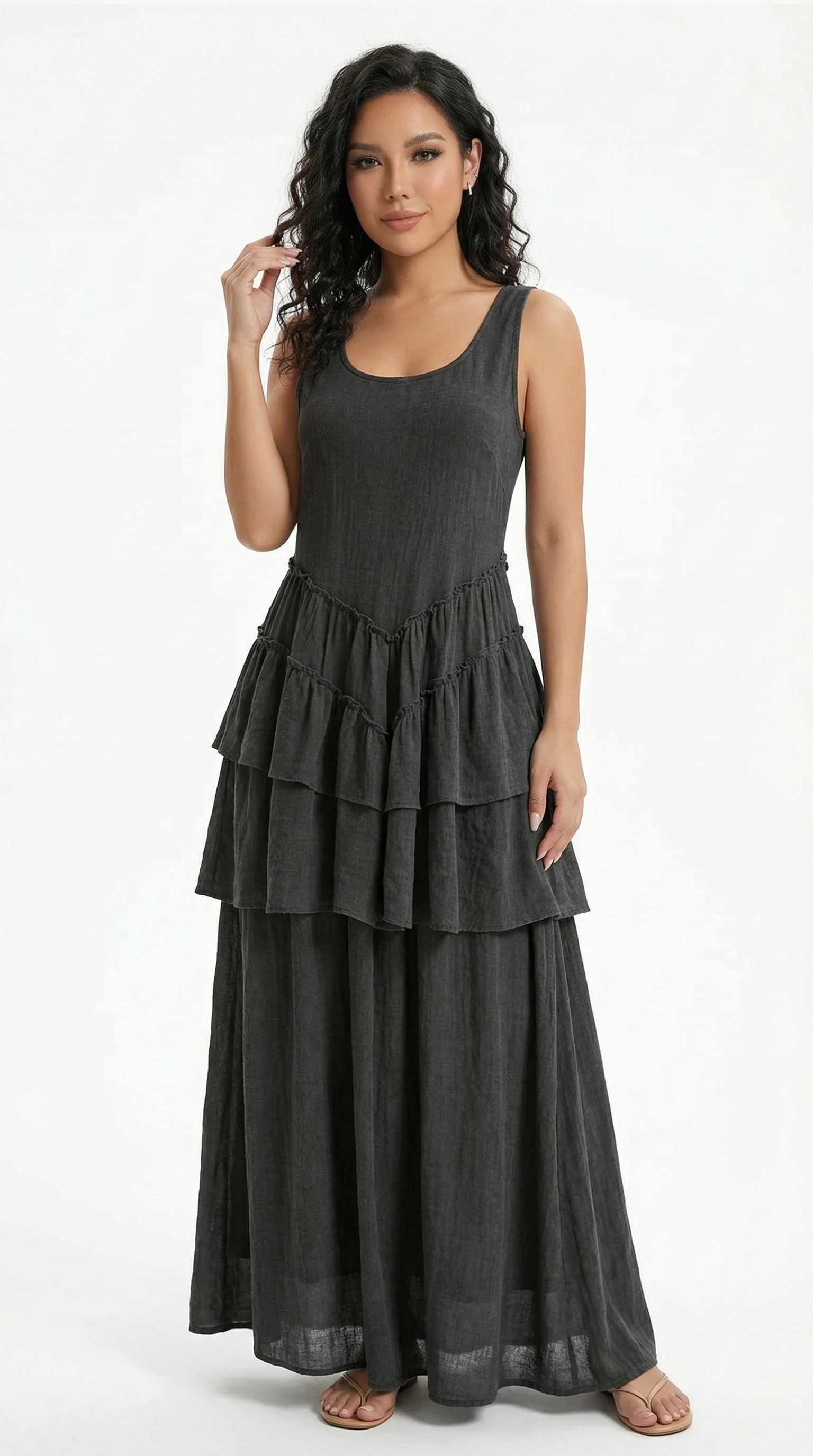 Woman wearing a beige dress with a white background