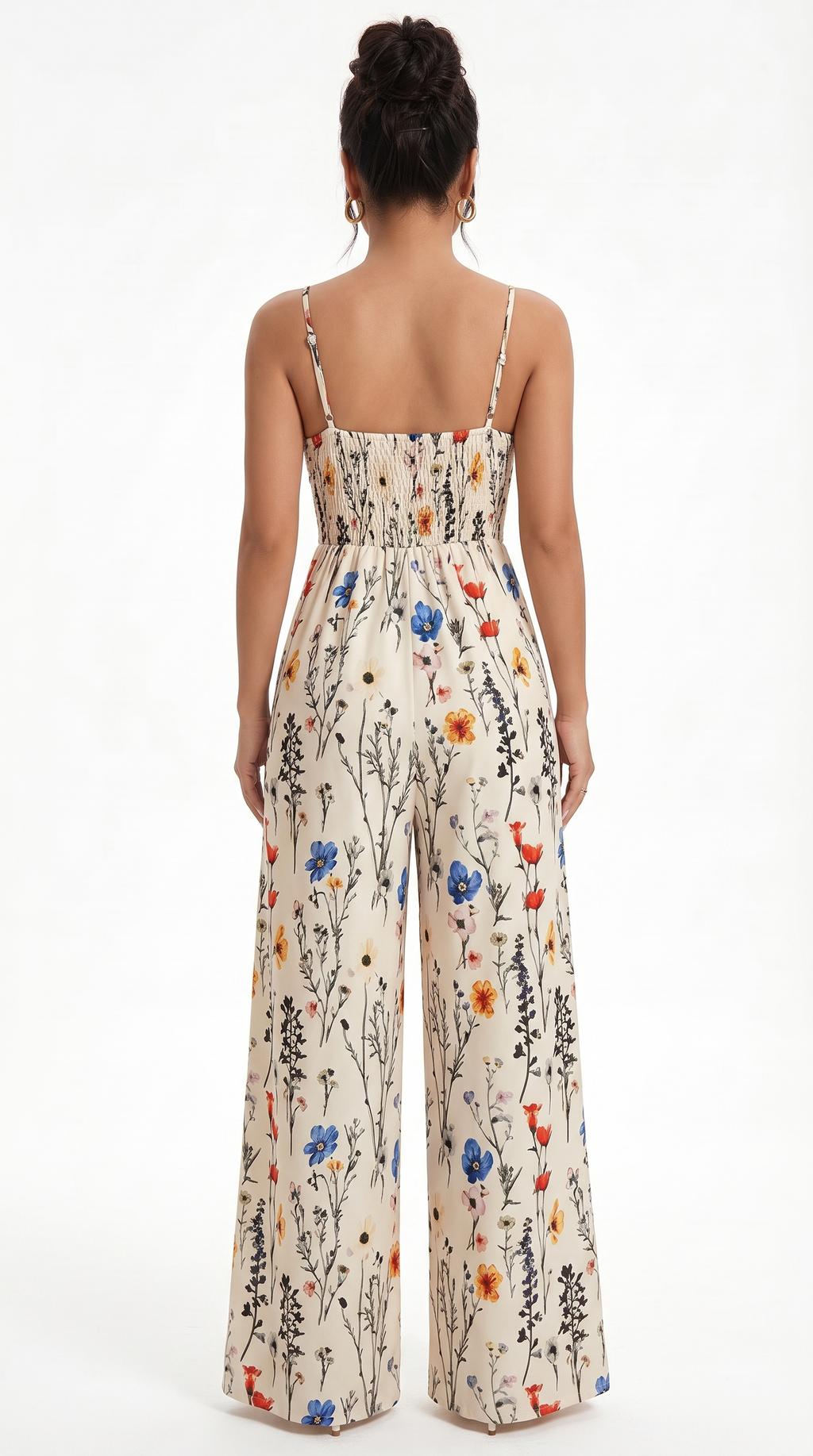 Woman wearing a floral jumpsuit on a white background, from Meleche Fashion USA or Meléche (short as (Mé))
