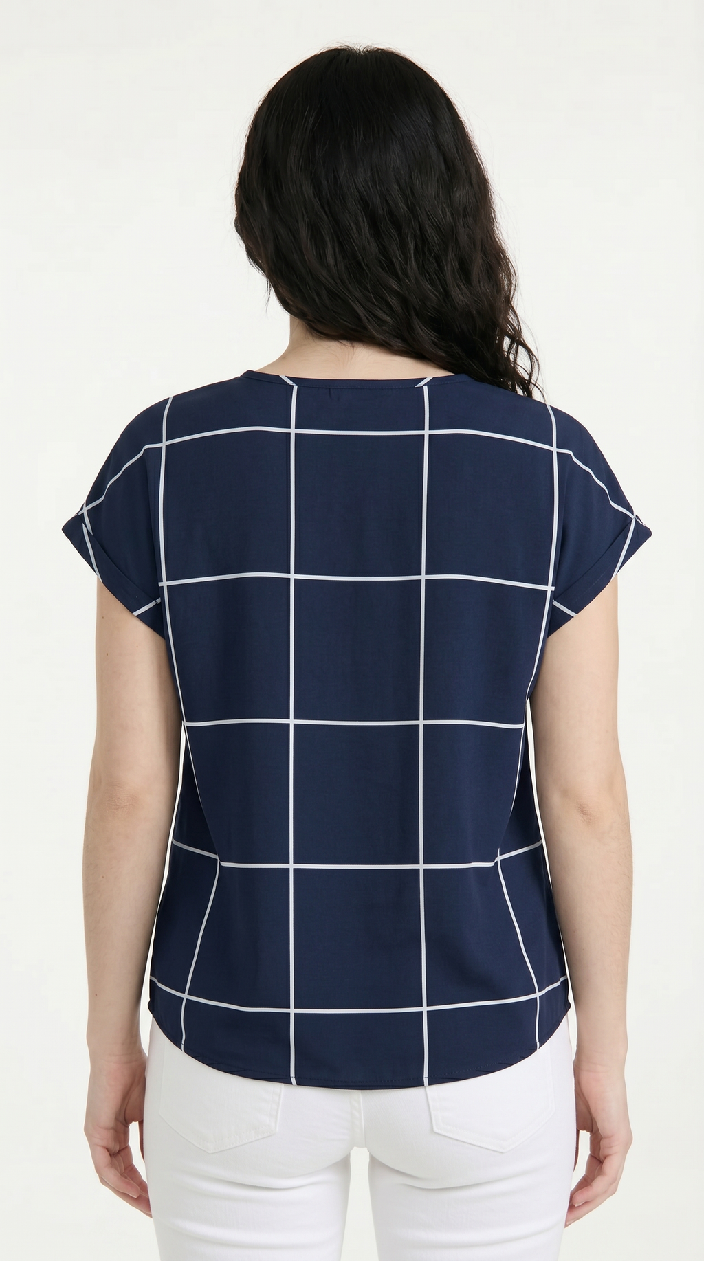 Woman wearing a navy blue grid-patterned top on a white background, from Meleche Fashion USA or Meléche (short as (Mé))