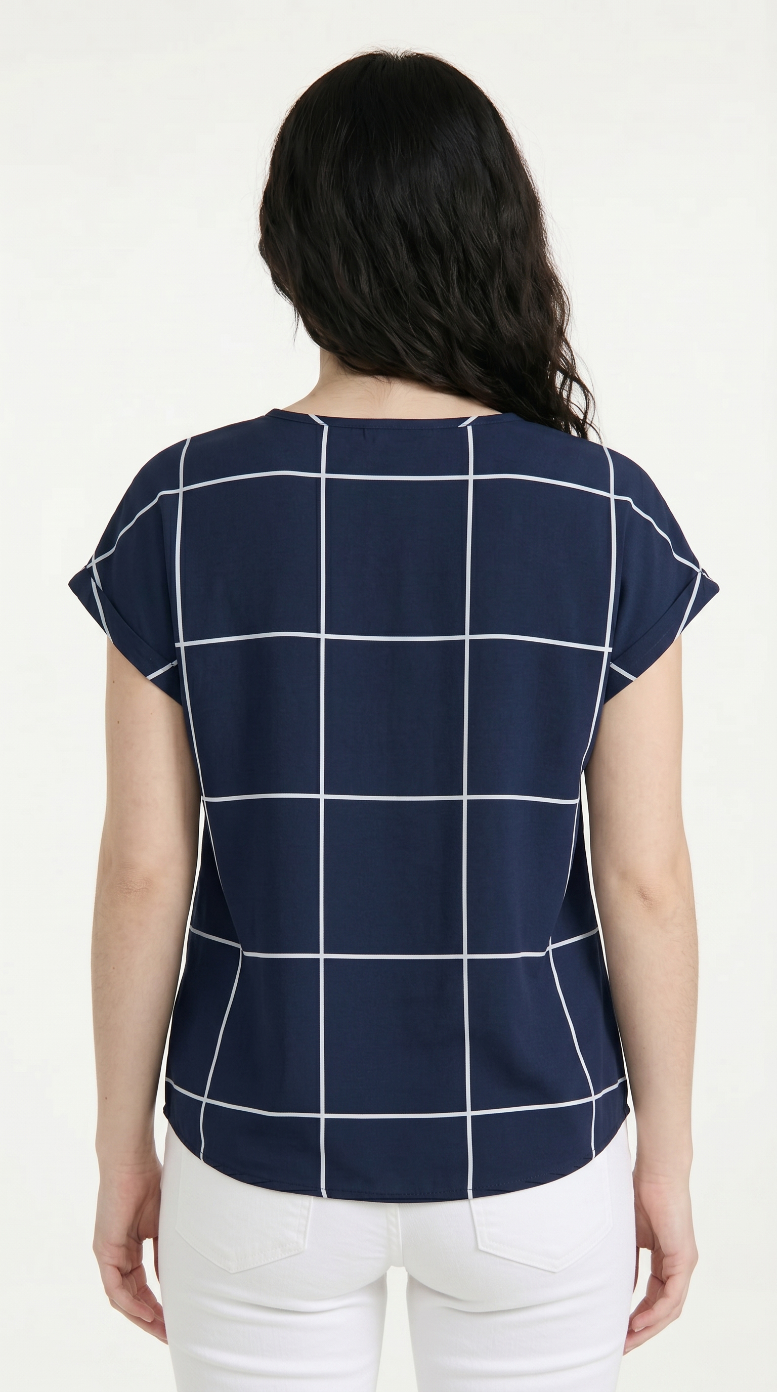 Woman wearing a navy blue grid-patterned top on a white background, from Meleche Fashion USA or Meléche (short as (Mé))