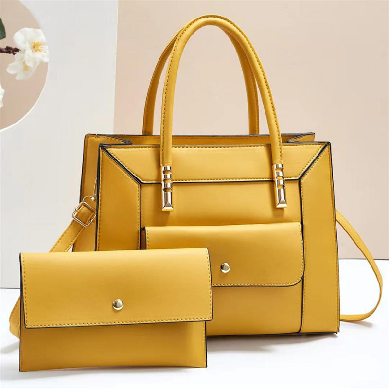 Jannik - Yellow handbag and matching wallet on a light from Meleche or Meléche (short as (Mé)) background