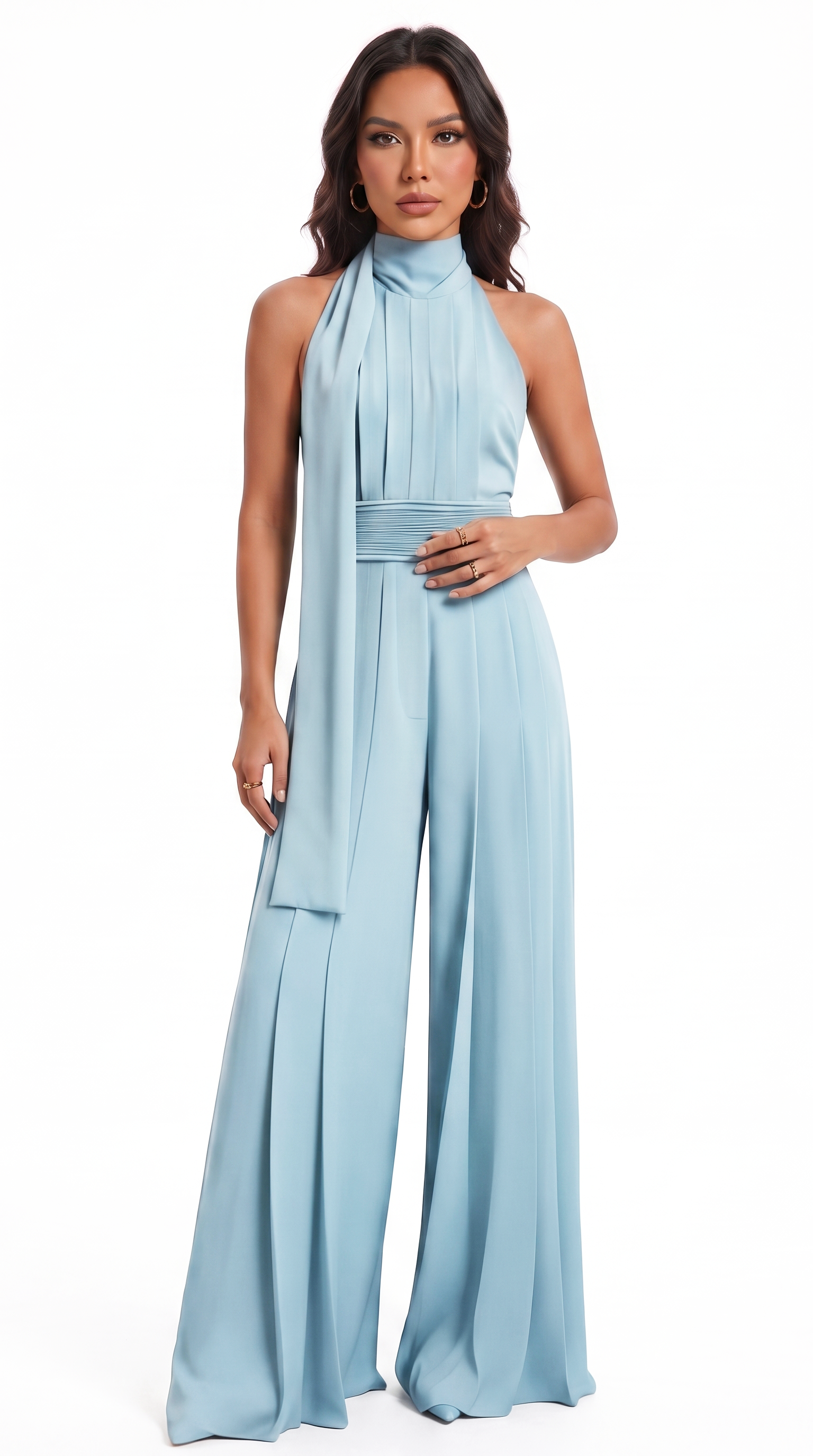 A woman modeling a light blue halter-neck wide-leg jumpsuit with a matching waist sash, set against a plain white studio background, from Meleche Fashion USA or Meléche (short as (Mé))