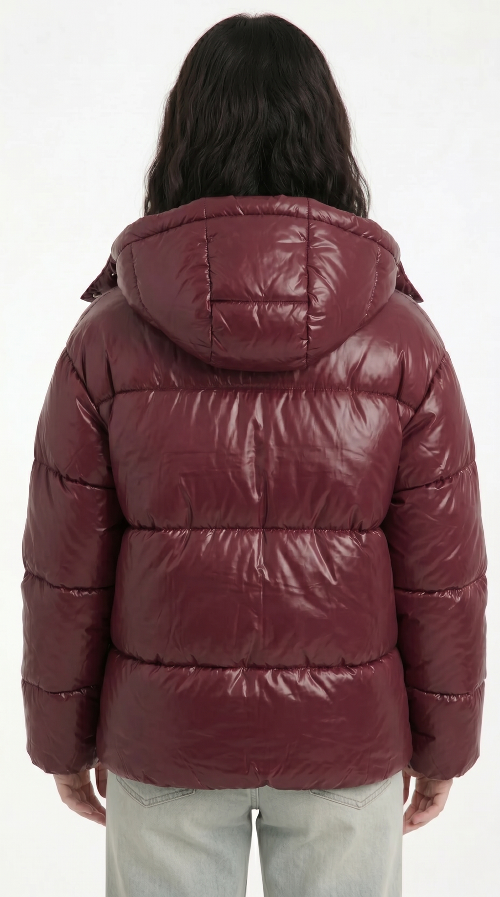 Person wearing a maroon puffer jacket on a white background from Meleche Fashion USA or Meléche (short as (Mé))