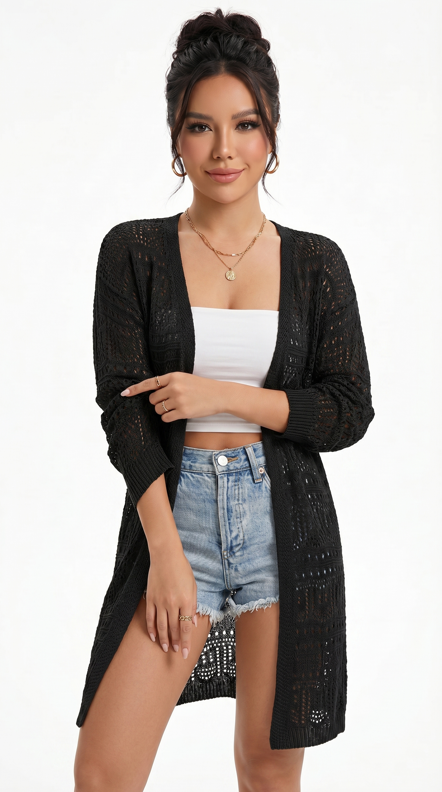 Woman wearing a black cardigan, white top, and denim shorts on a white background from Meleche or Meléche (short as (Mé))