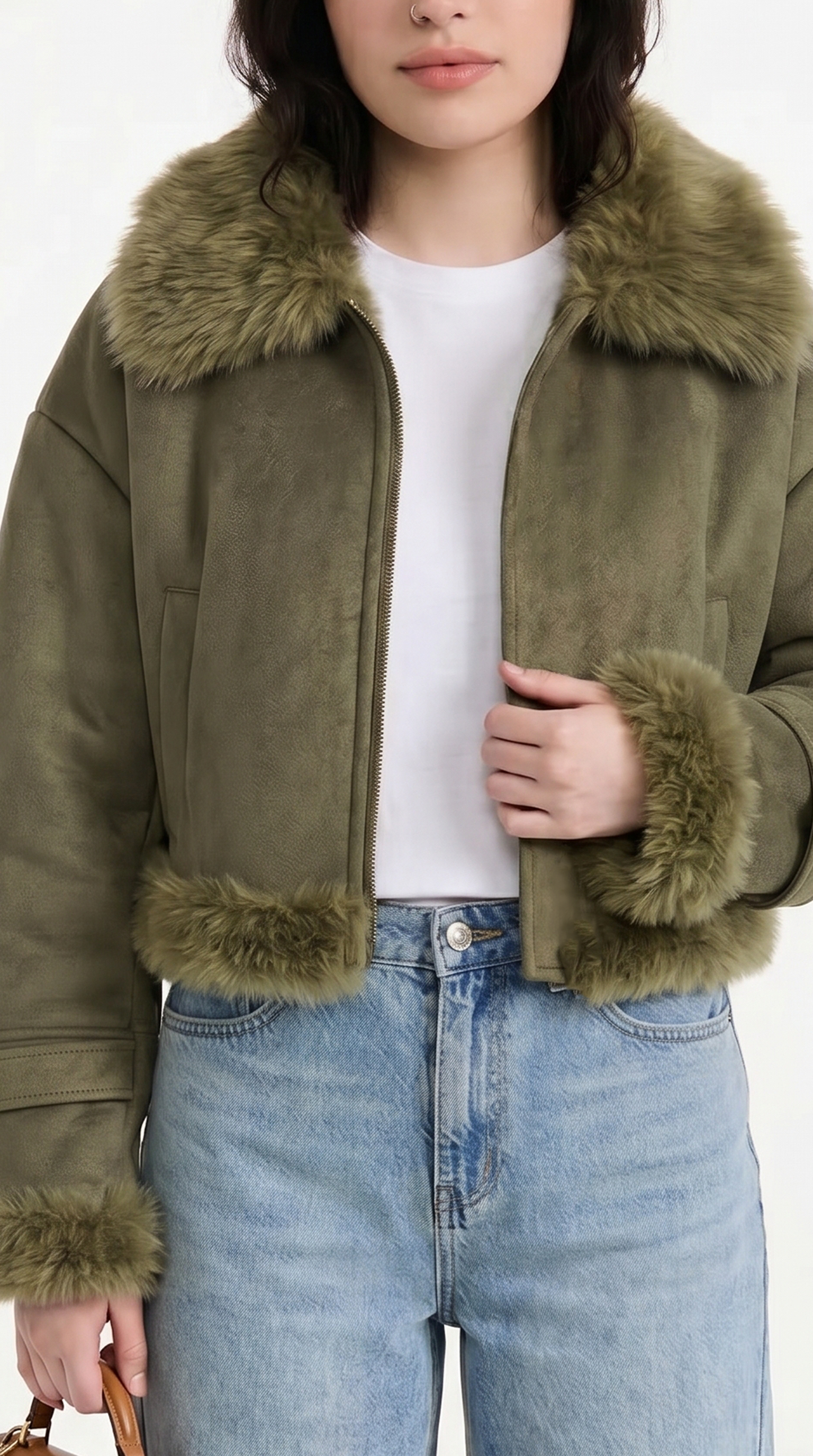 Person wearing a green jacket with fur trim and blue jeans on a white background from Meleche or Meléche USA (short as (Mé))