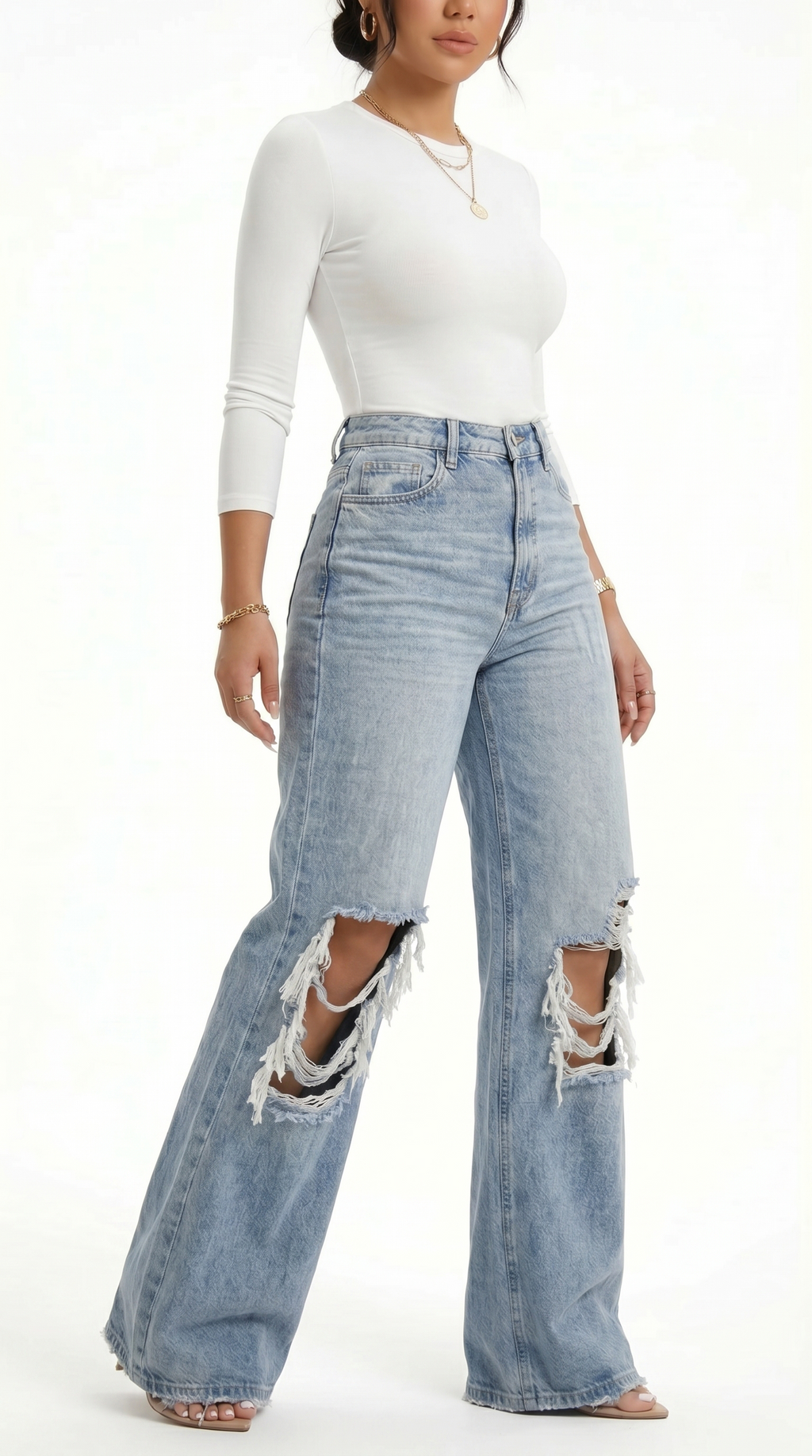 Person wearing light blue ripped jeans and a white top on a white background, Wide-leg jeans from Meleche Fashion USA or Meléche (short as (Mé))