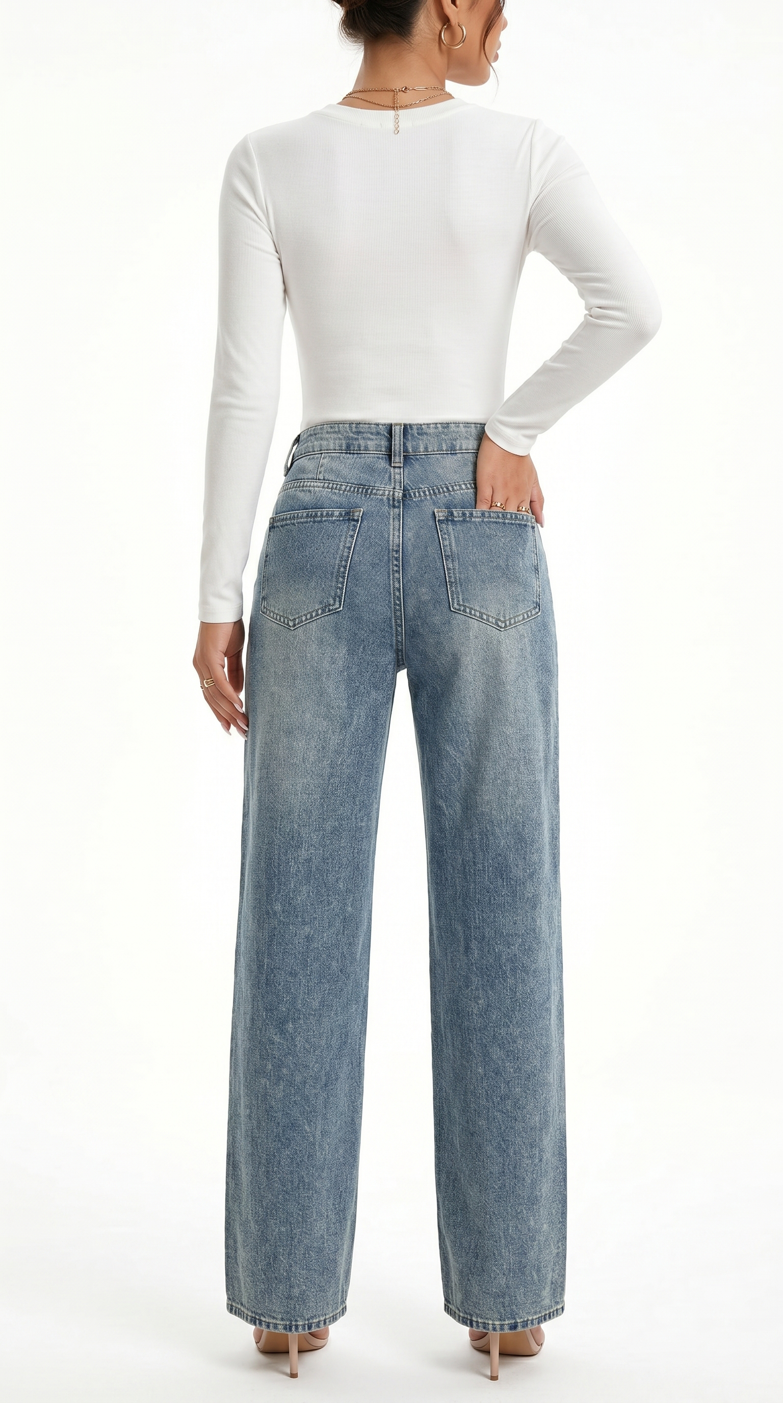 Person wearing light blue jeans and a white long-sleeve top on a white background, Wide-leg jeans from Meleche Fashion USA or Meléche (short as (Mé))