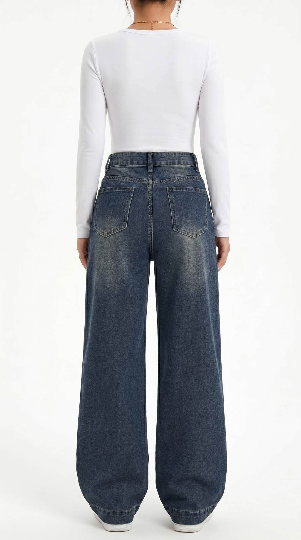 Person wearing blue wide-leg jeans and a white long-sleeve shirt on a white background, wide jeans from Meleche Fashion USA or Meléche (short as (Mé))