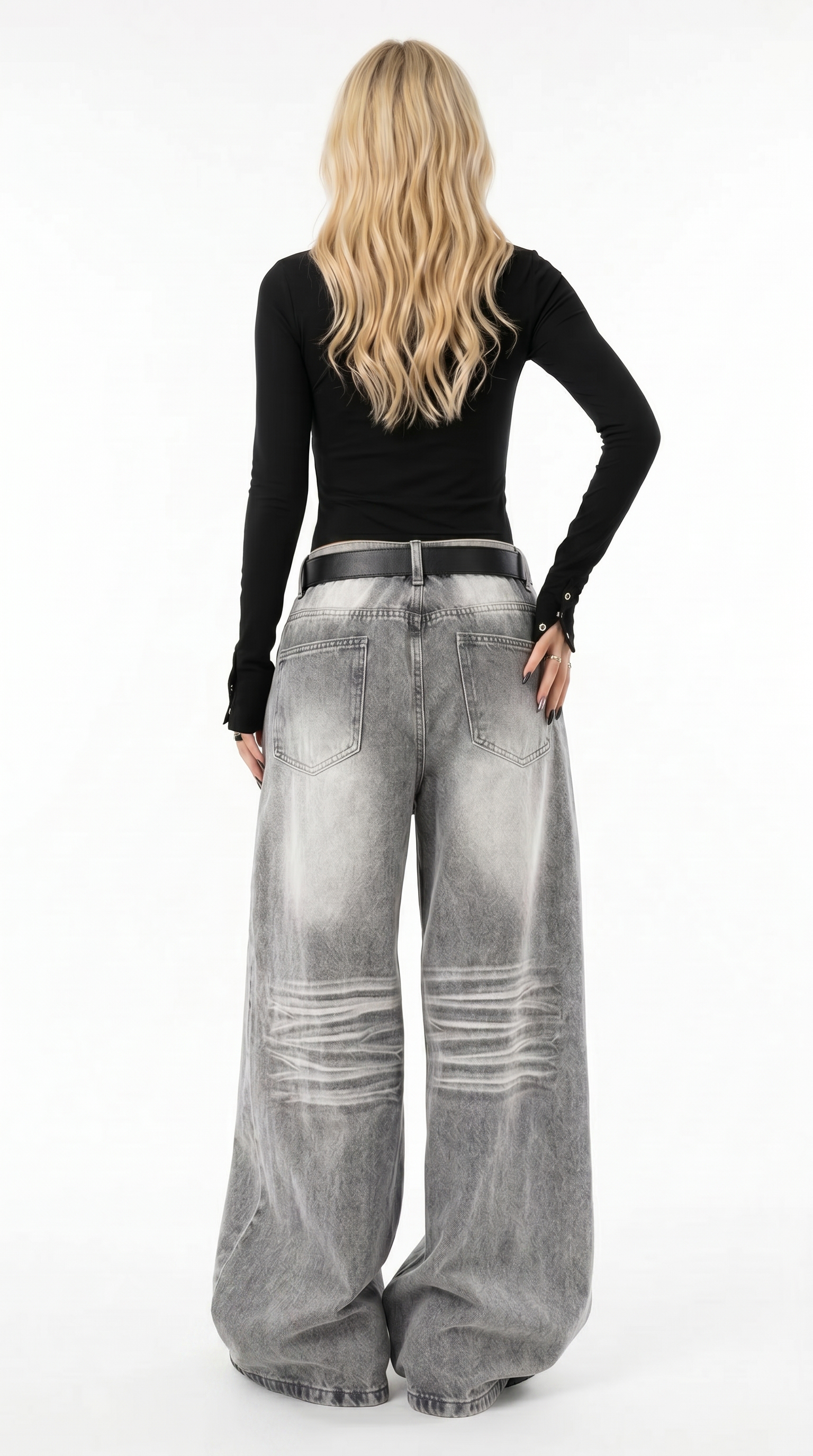 Person wearing a black top and gray wide-leg jeans on a white background jeans from Meleche Fashion USA or Meléche (short as (Mé))