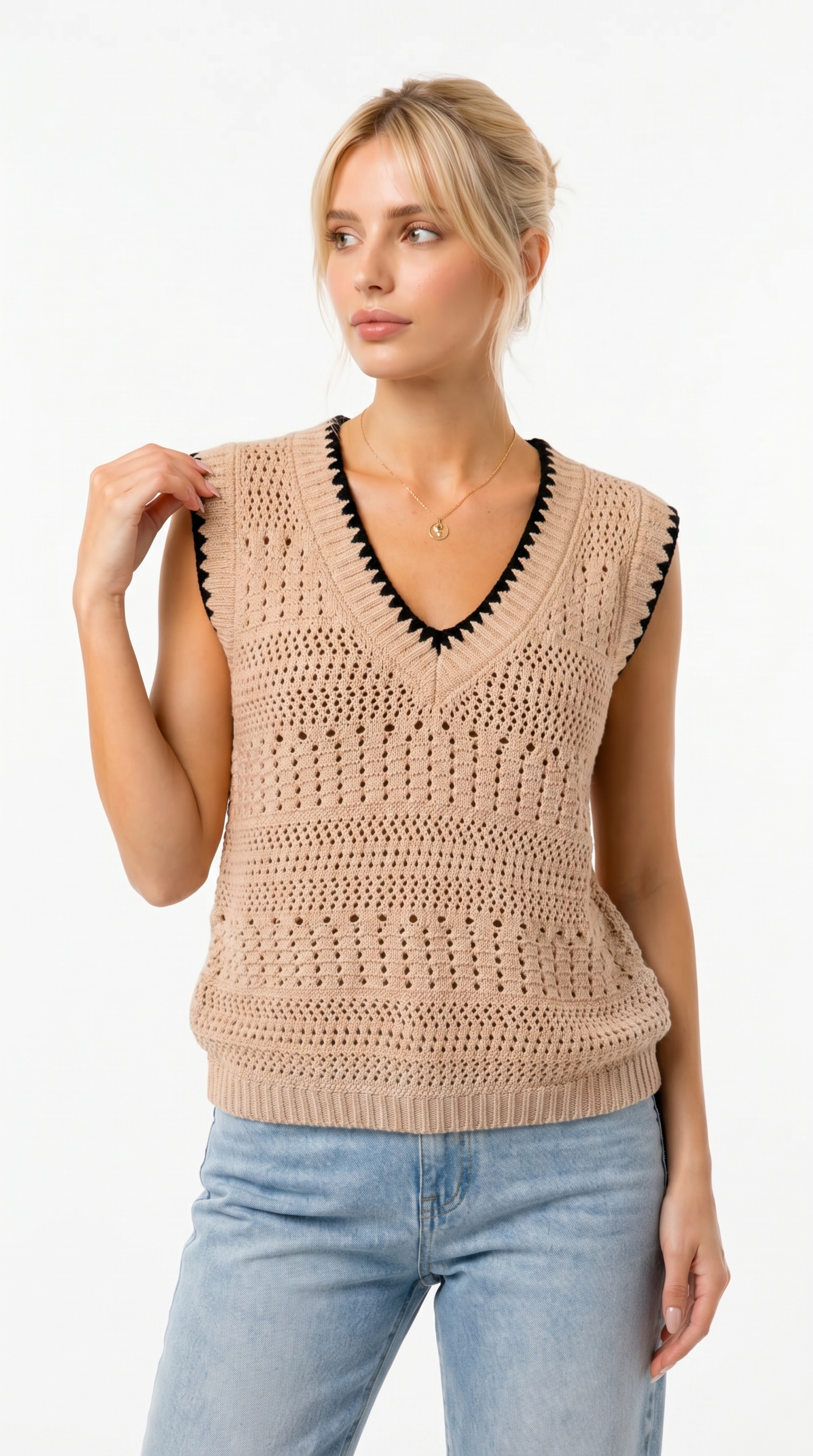 Woman wearing a beige crochet sleeveless top with black trim on a white background from Meleche Fashion USA or Meléche (short as (Mé))