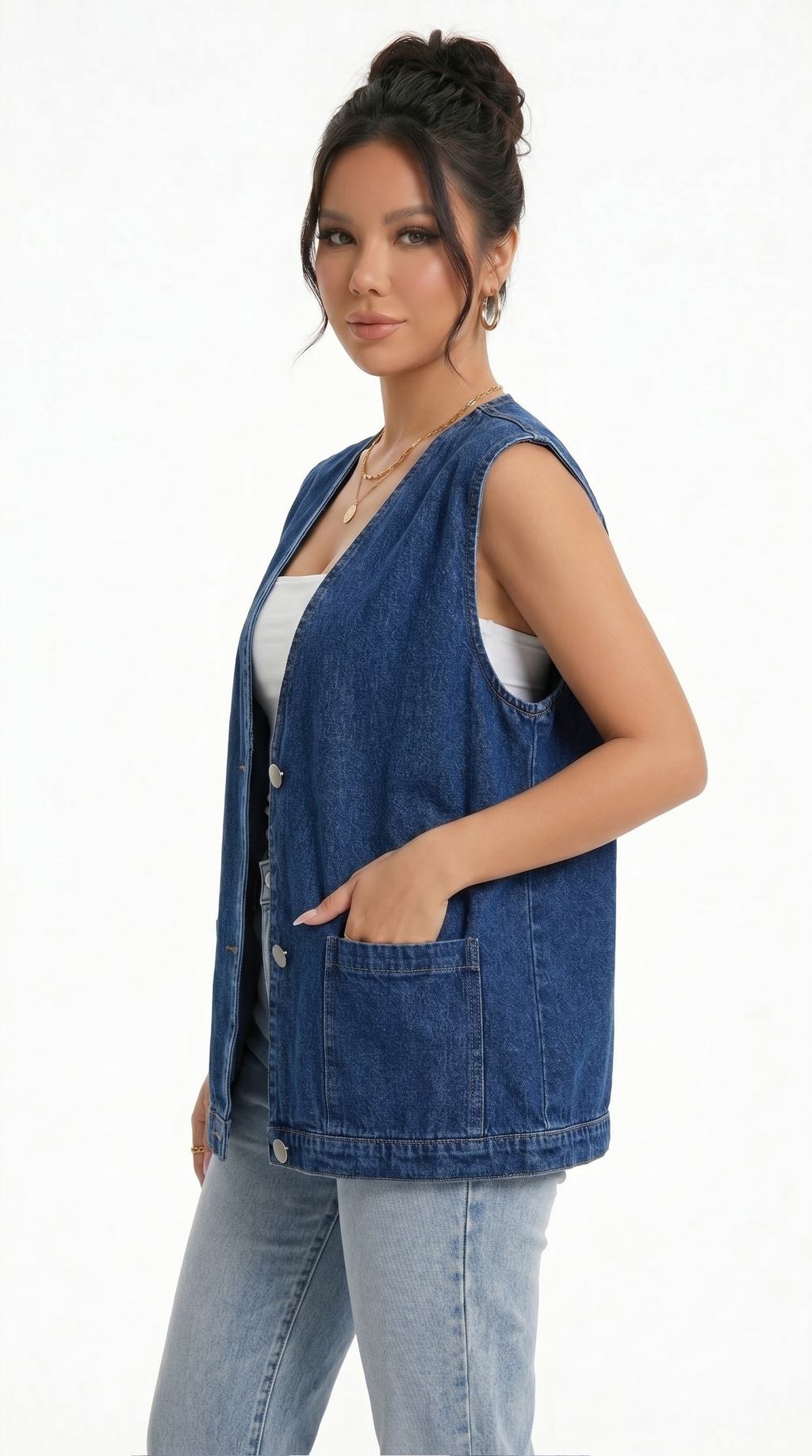 Woman wearing a blue denim vest over a white top on a white background from Meleche Fashion USA or Meléche (short as (Mé))