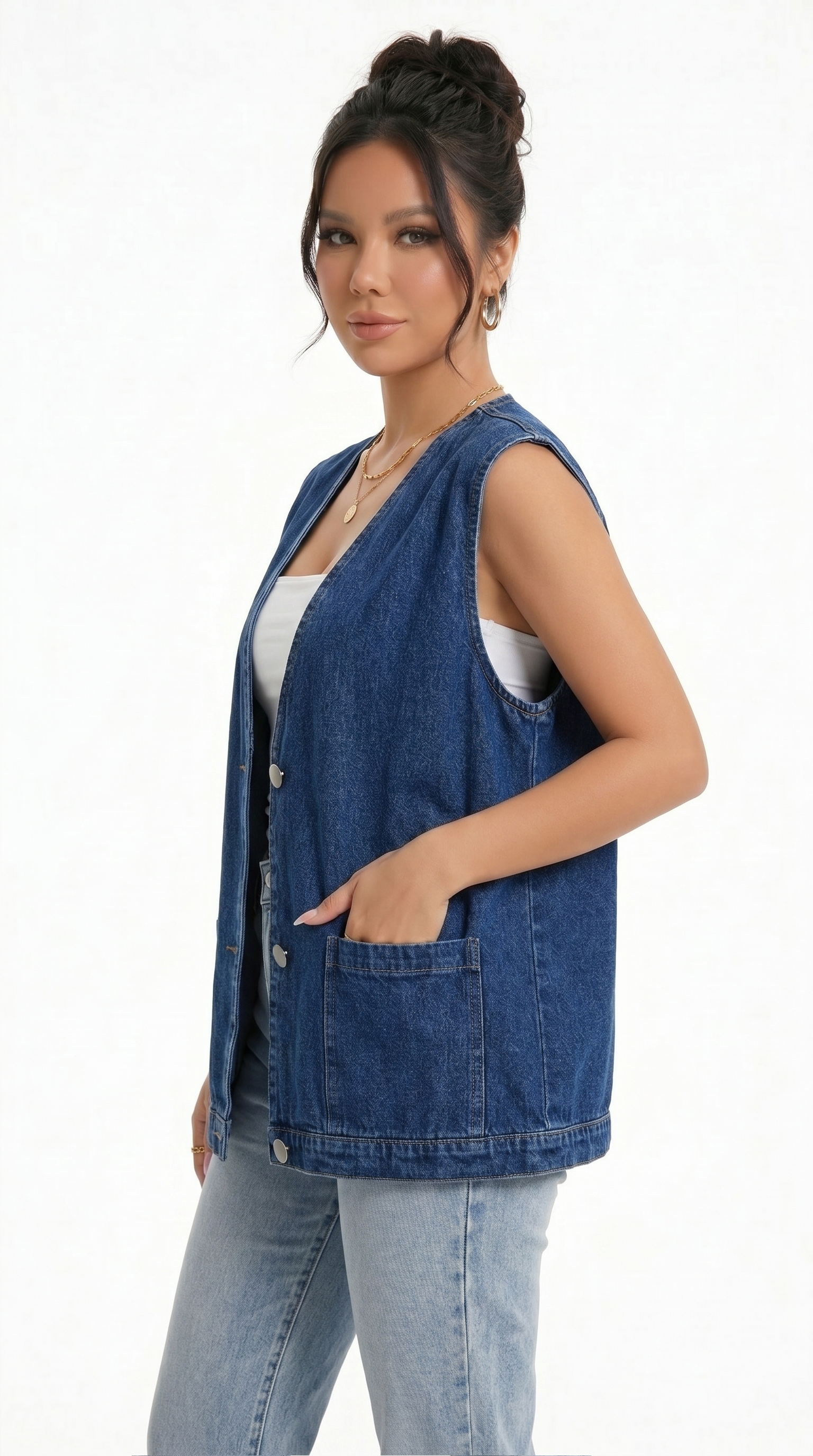 Woman wearing a blue denim vest over a white top on a white background from Meleche Fashion USA or Meléche (short as (Mé))