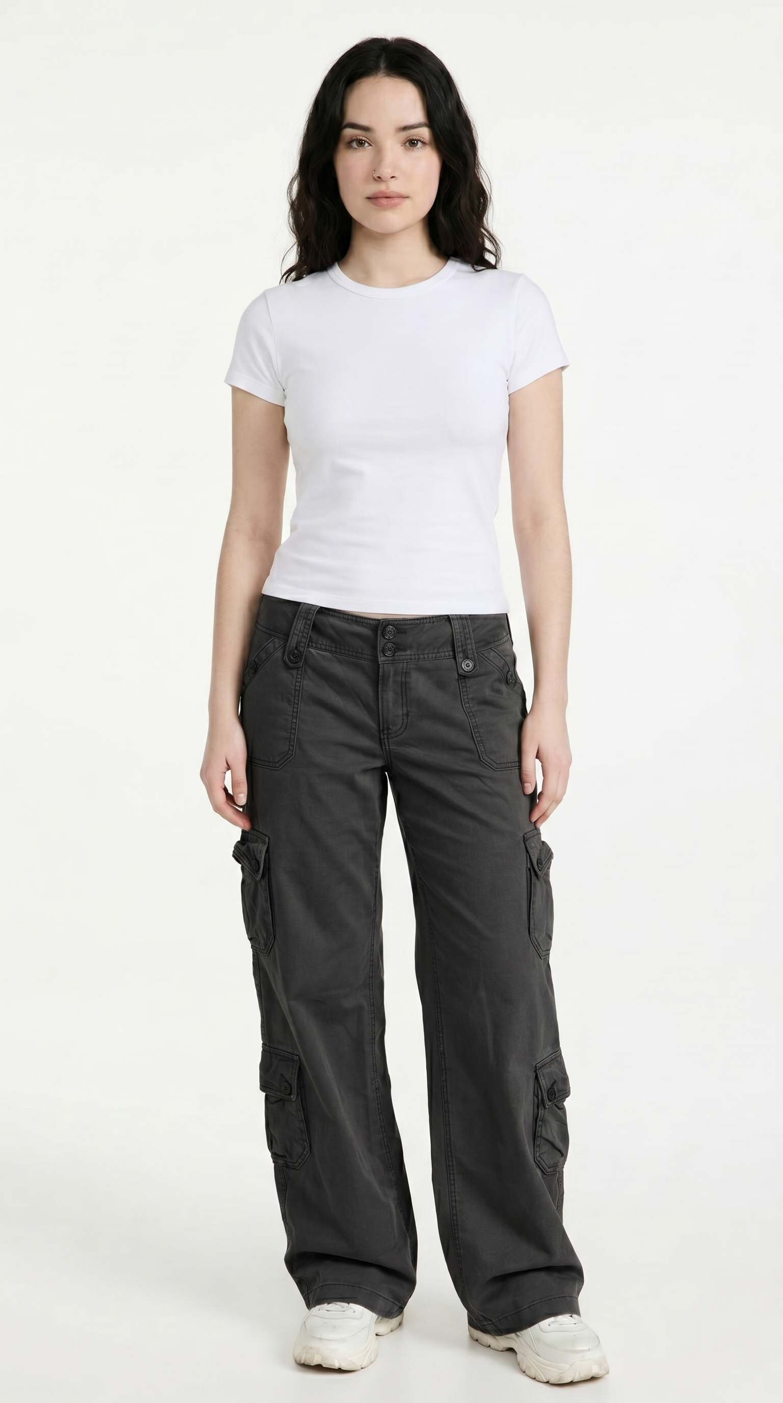 Woman wearing a white t-shirt and dark cargo pants on a white background, from Meleche Fashion USA or Meléche (short as (Mé))