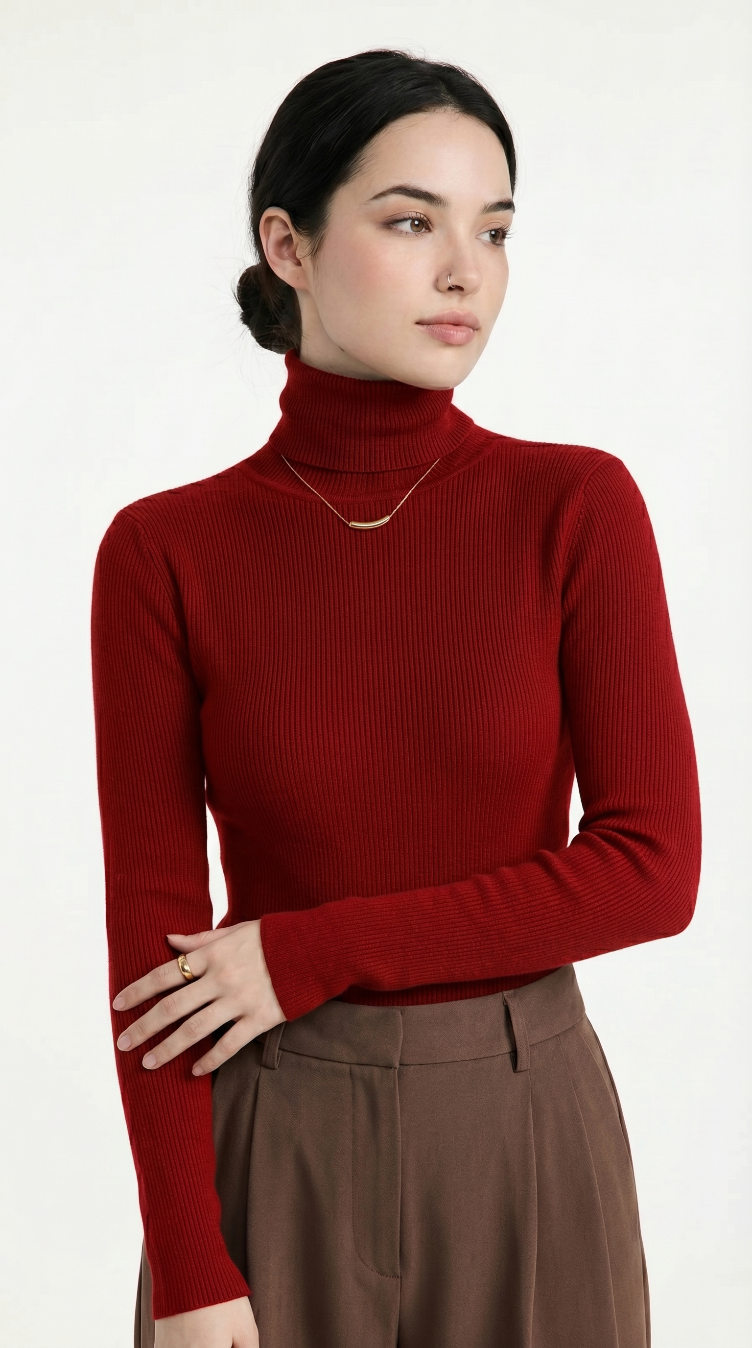 Woman wearing a red turtleneck sweater and brown pants on a white background from Meleche or Meléche USA (short as (Mé))