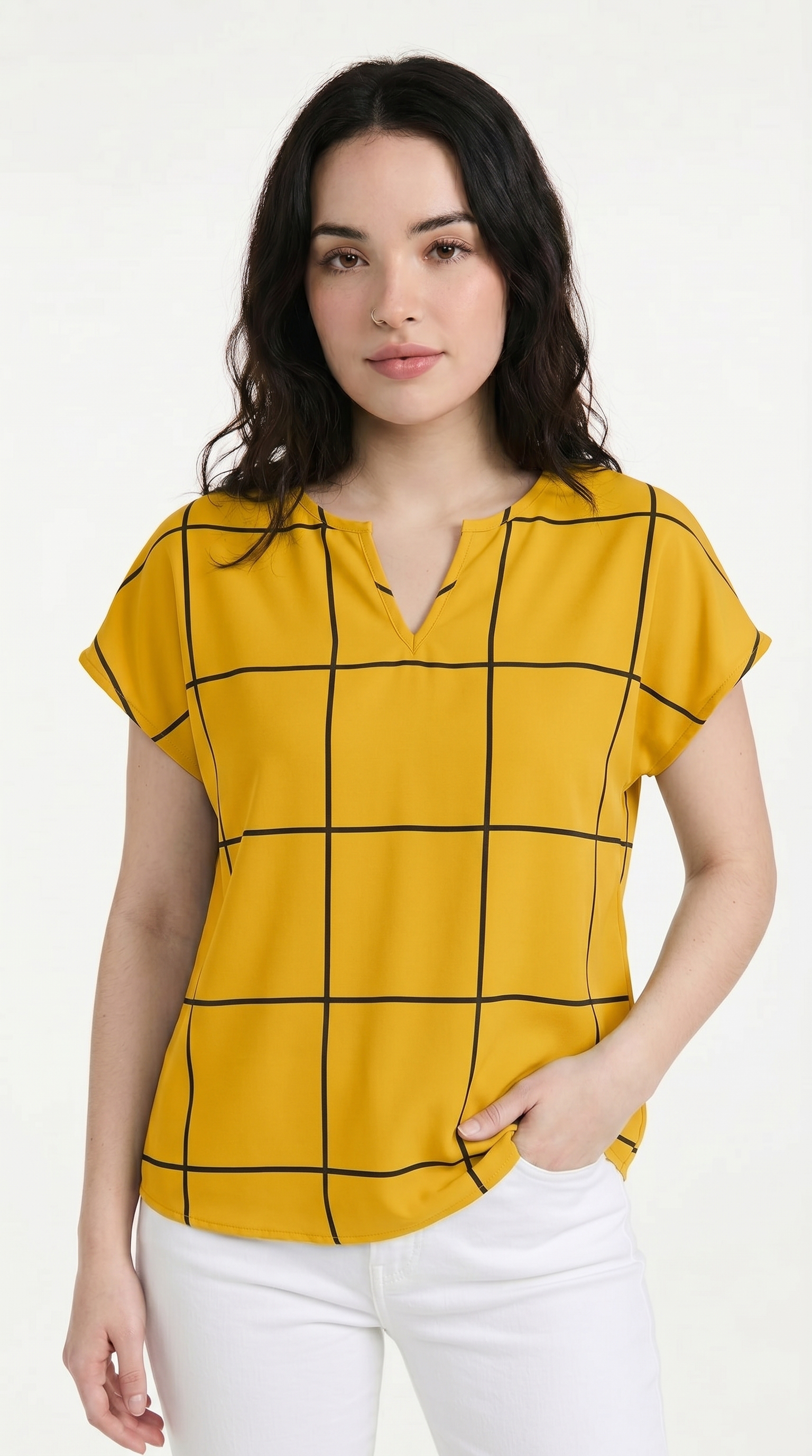 Woman wearing a yellow checkered blouse with white pants on a white background, from Meleche Fashion USA or Meléche (short as (Mé))