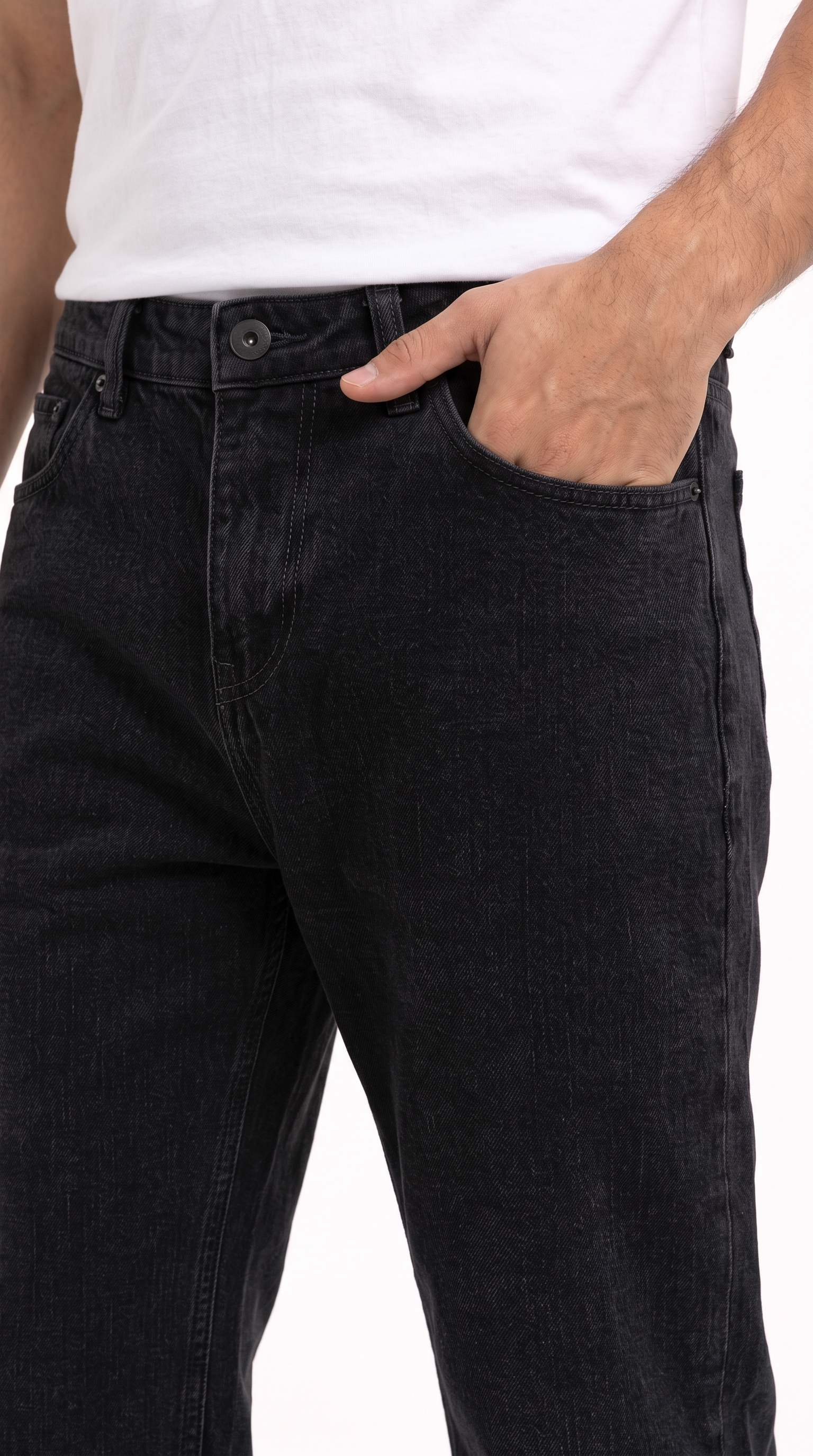 Close-up of a person wearing black denim jeans with a white tank top, showing the front pocket and side pocket with one hand in the pocket, from Meleche Fashion USA or Meléche (short as (Mé))