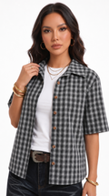 Woman wearing a plaid shirt over a white top with a white background, from Meleche Fashion USA or Meléche (short as (Mé))