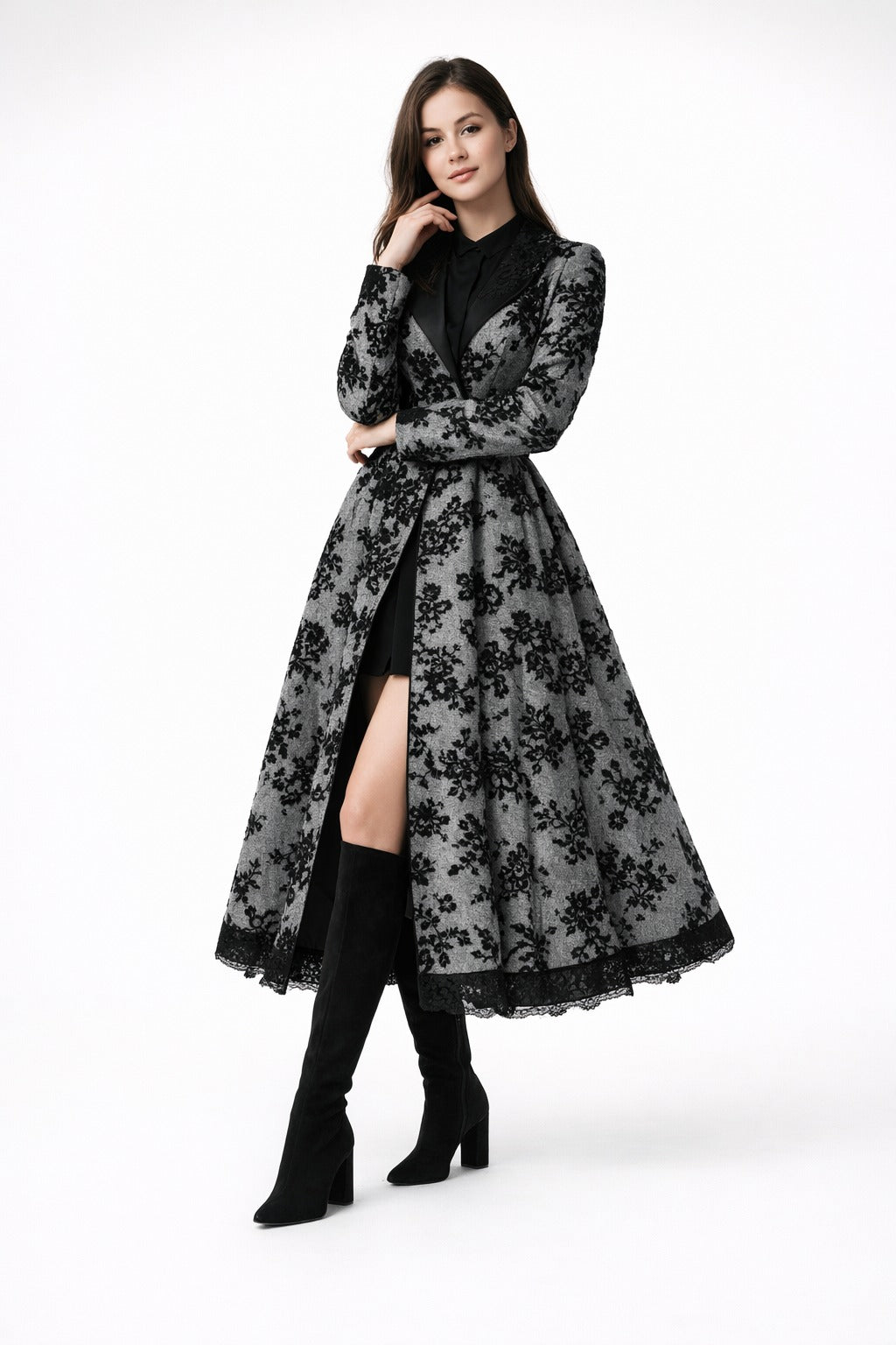 Mia Gray wearing a black floral lace dress Eden dress from Meleche or Meléche (short as (Mé)) with a white background