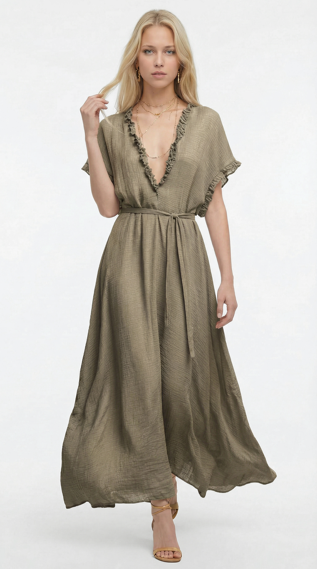 Woman wearing a gray one-shoulder dress on a white background from Meleche USA or Meléche (short as (Mé))