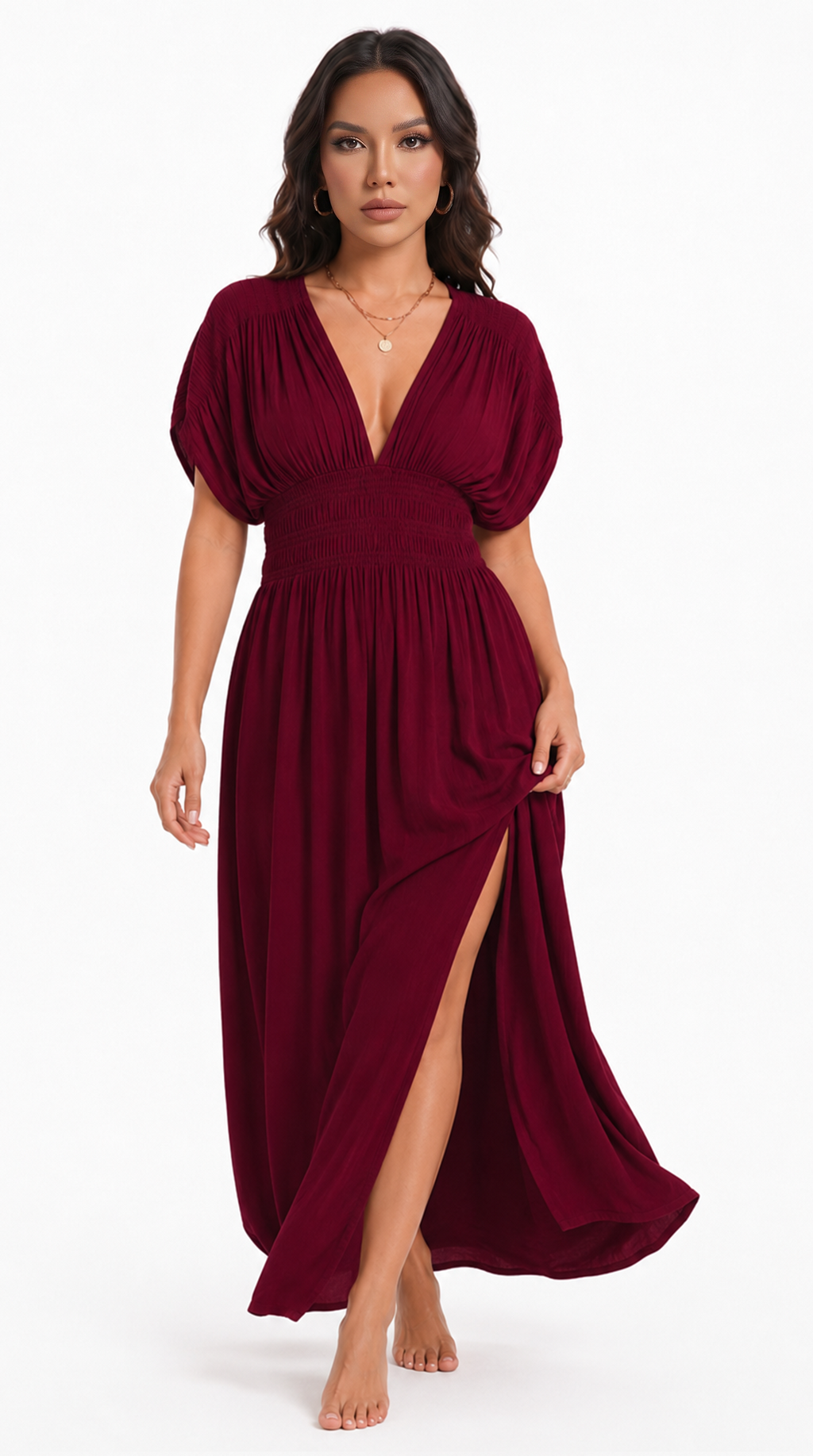 A woman modeling a flowing red maxi dress with a deep V-neckline, short puff sleeves, and a gathered waist, set against a plain white studio background, from Meleche Fashion USA or Meléche (short as (Mé))