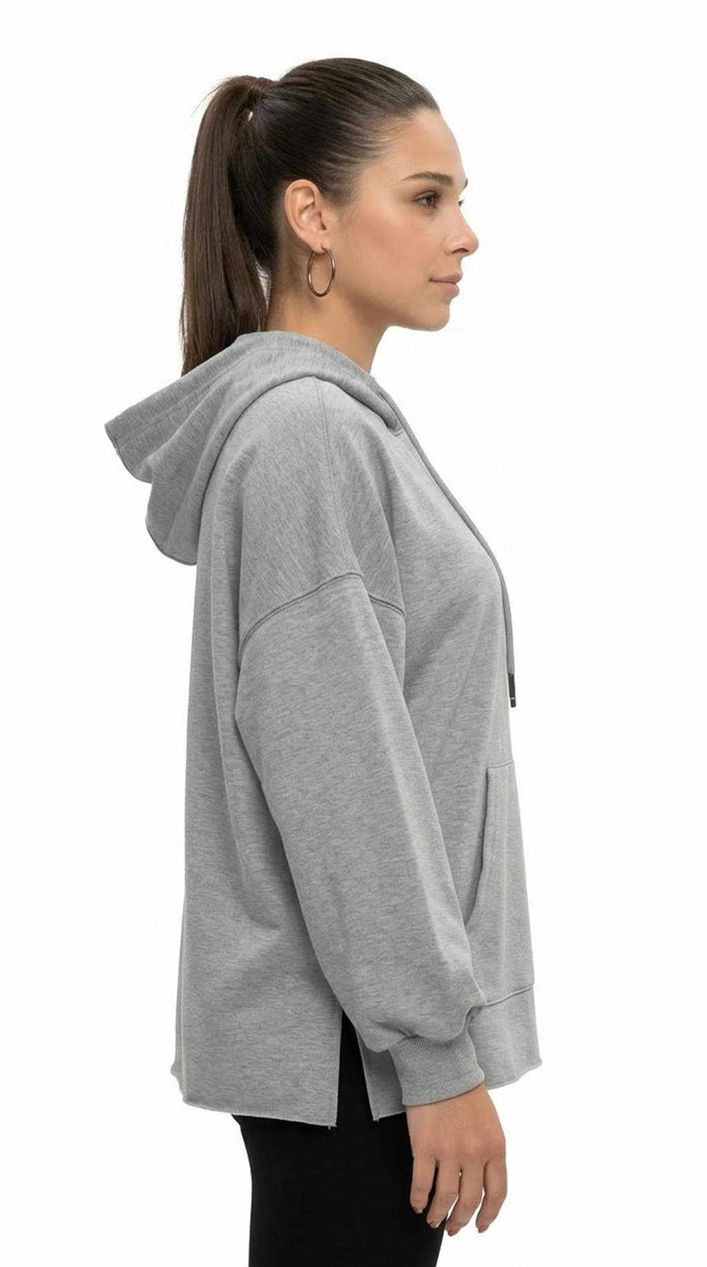 Woman wearing a gray hoodie from Meleche or Meléche (short as (Mé))