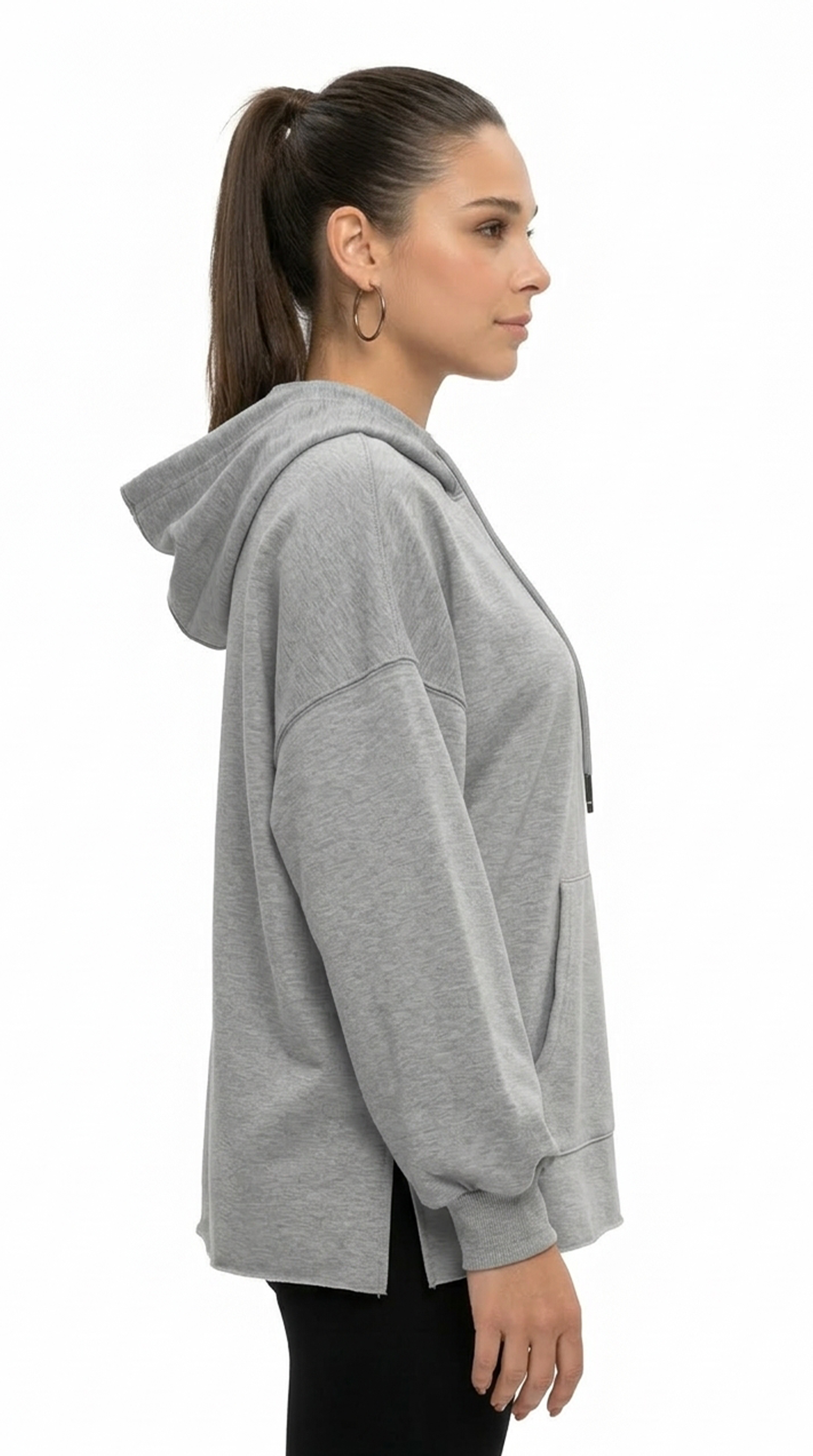 Woman wearing a gray hoodie from Meleche or Meléche (short as (Mé))