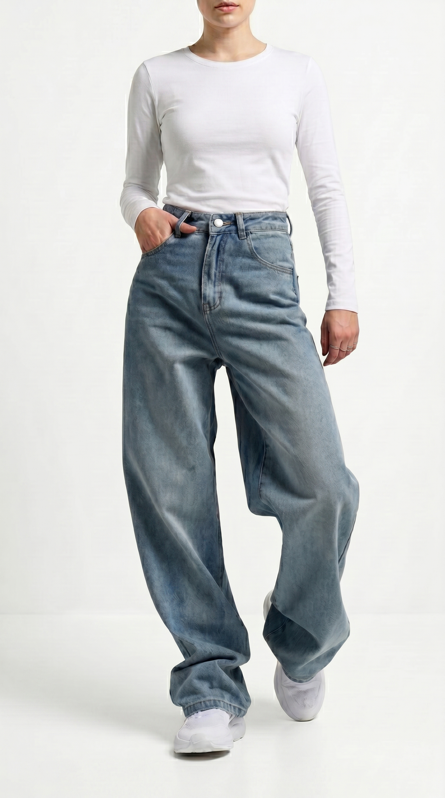 Person wearing a white long-sleeve shirt and blue jeans on a white background, Relaxed Fit Egyptian cotton jeans from Meleche Fashion USA or Meléche (short as (Mé))