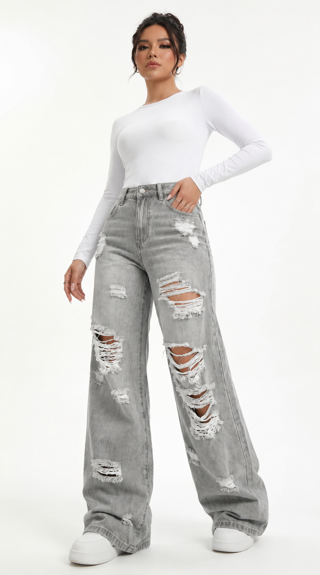 Woman wearing a white long-sleeve top and gray ripped jeans on a white background, Wide-leg jeans from Meleche Fashion USA or Meléche (short as (Mé))