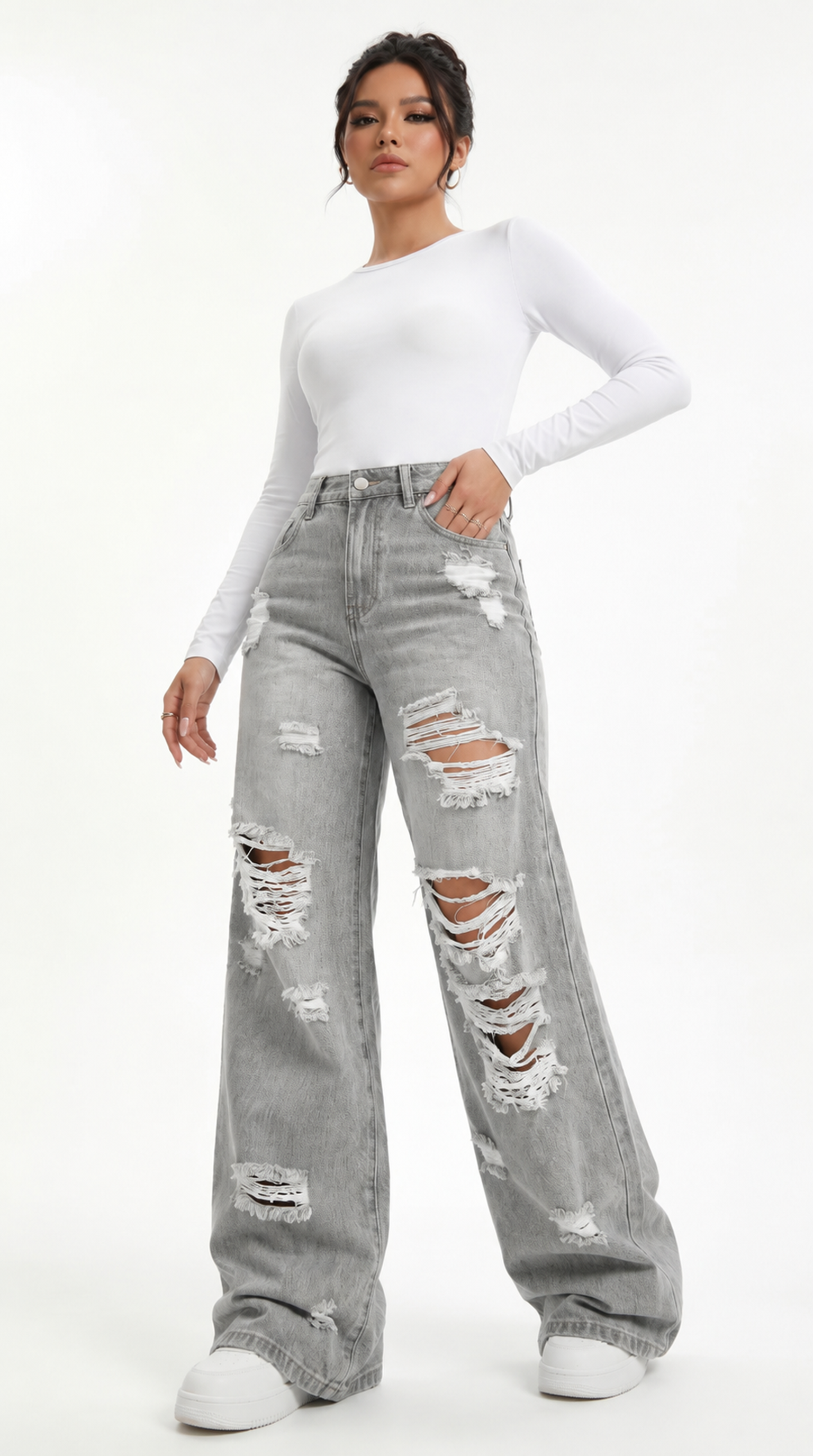 Woman wearing a white long-sleeve top and gray ripped jeans on a white background, Wide-leg jeans from Meleche Fashion USA or Meléche (short as (Mé))
