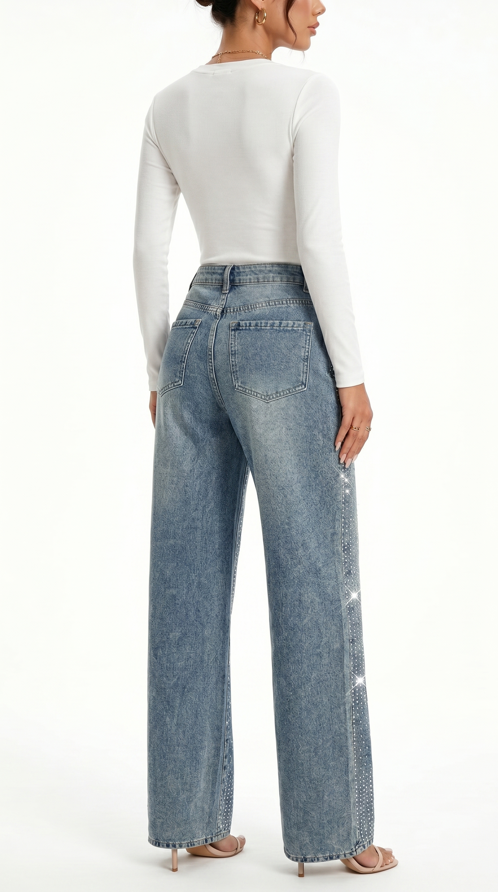 Person wearing light blue jeans and a white long-sleeve top on a white background, Wide-leg jeans from Meleche Fashion USA or Meléche (short as (Mé))