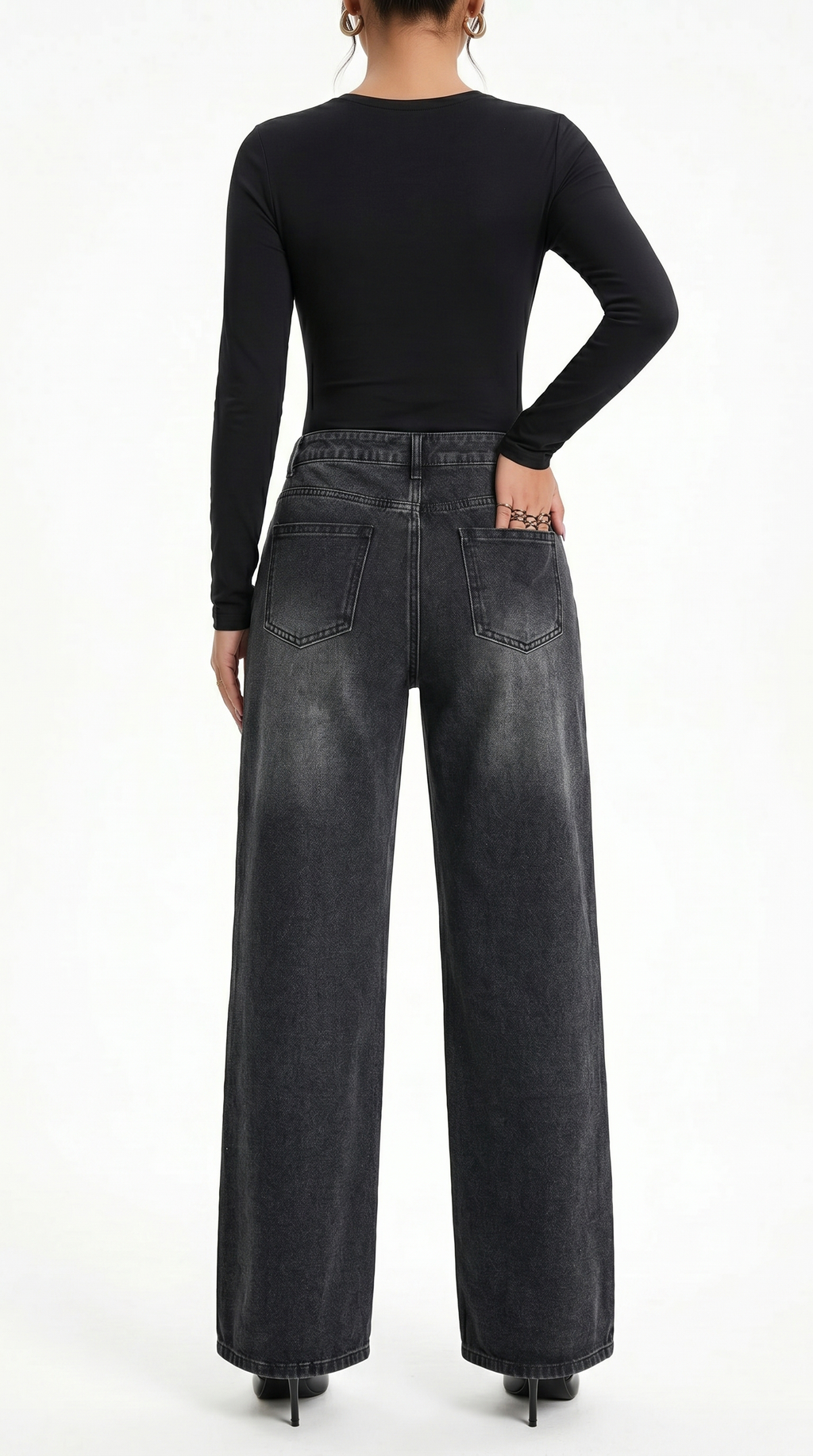 Person wearing black high-waisted jeans and a black long-sleeve top on a white background, Wide-leg jeans from Meleche Fashion USA or Meléche (short as (Mé))