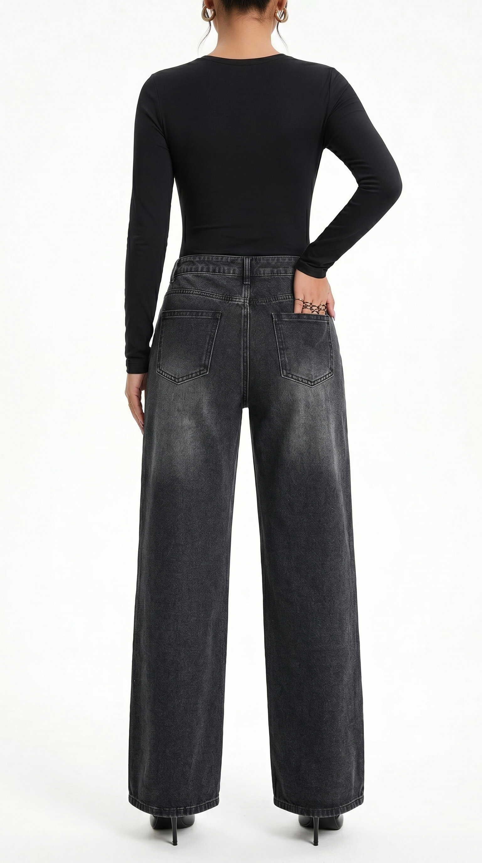 Person wearing black high-waisted jeans and a black long-sleeve top on a white background, Wide-leg jeans from Meleche Fashion USA or Meléche (short as (Mé))