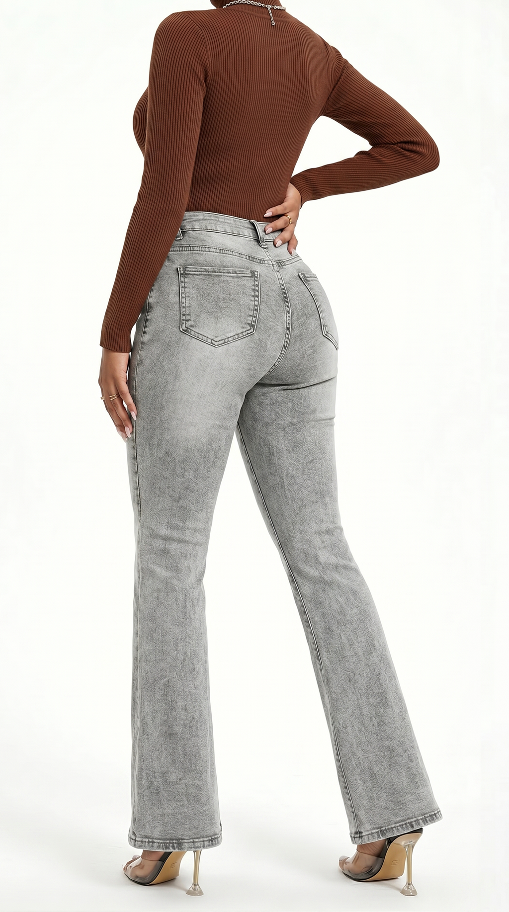 Person wearing gray flared jeans and a brown top on a white background, Slim flares jeans from Meleche Fashion USA or Meléche (short as (Mé))