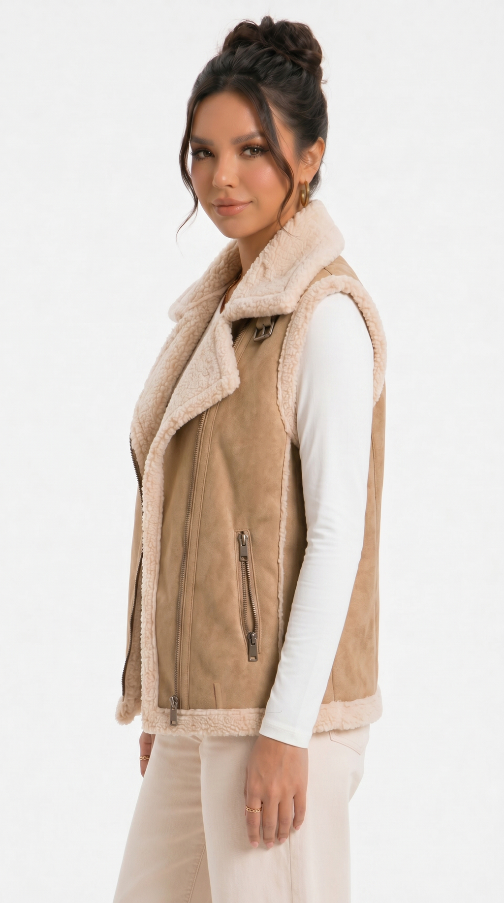 Woman wearing a beige vest with a white background from Meleche Fashion USA or Meléche (short as (Mé))