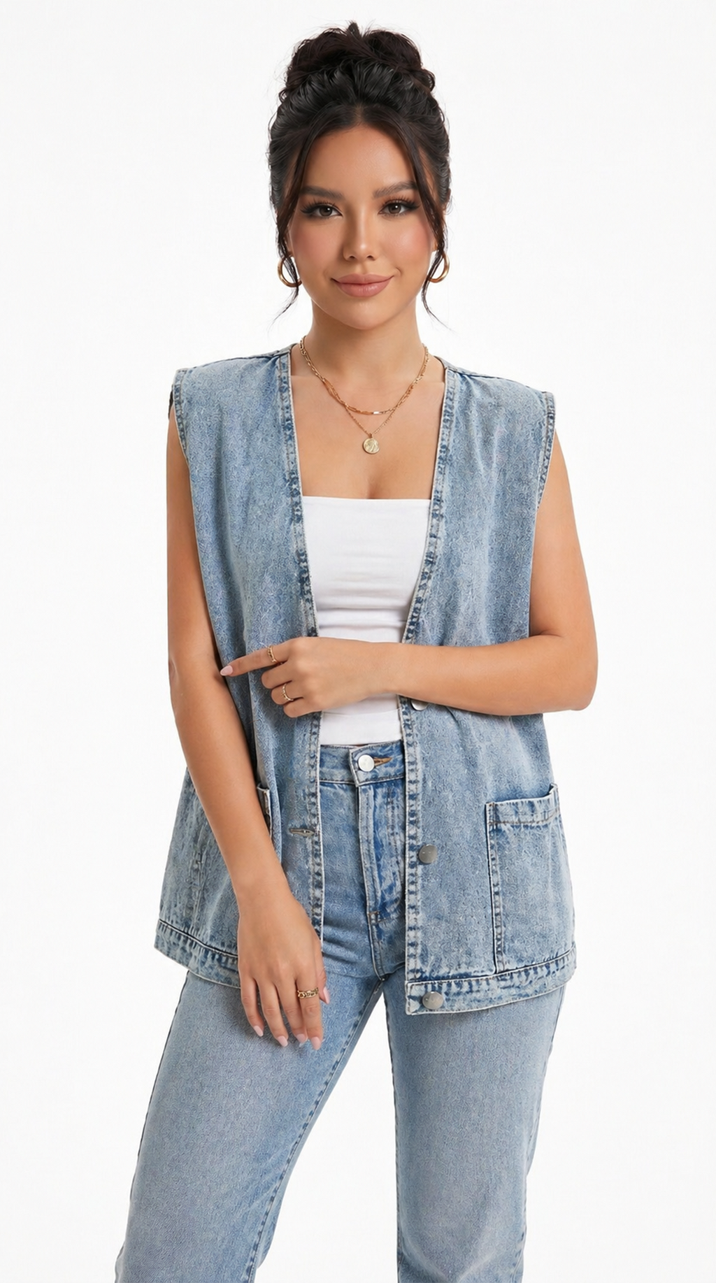 Woman wearing a denim vest over a white top on a white background from Meleche Fashion USA or Meléche (short as (Mé))