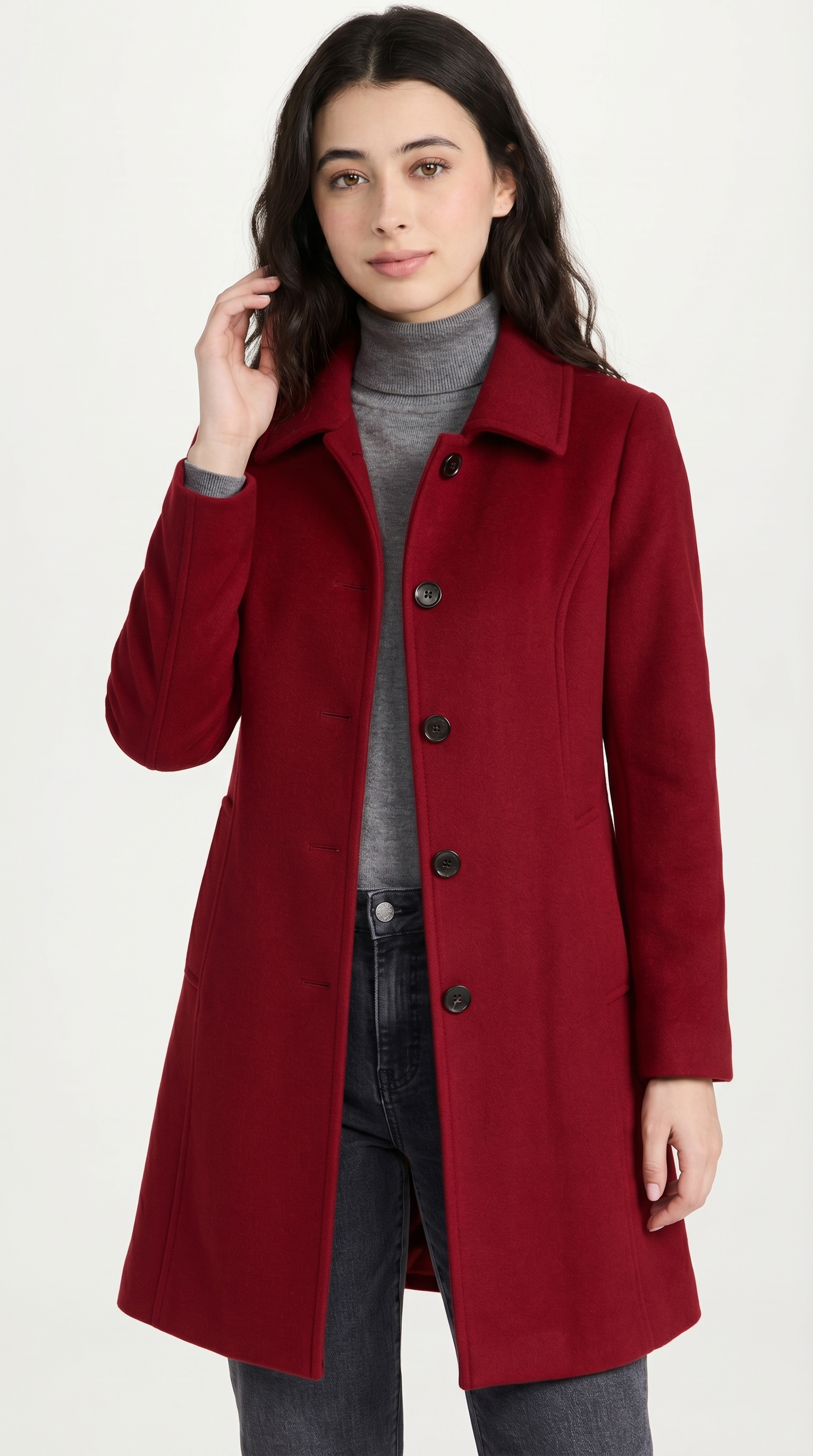Woman wearing a red coat on a white background from Meleche USA or Meléche (short as (Mé))