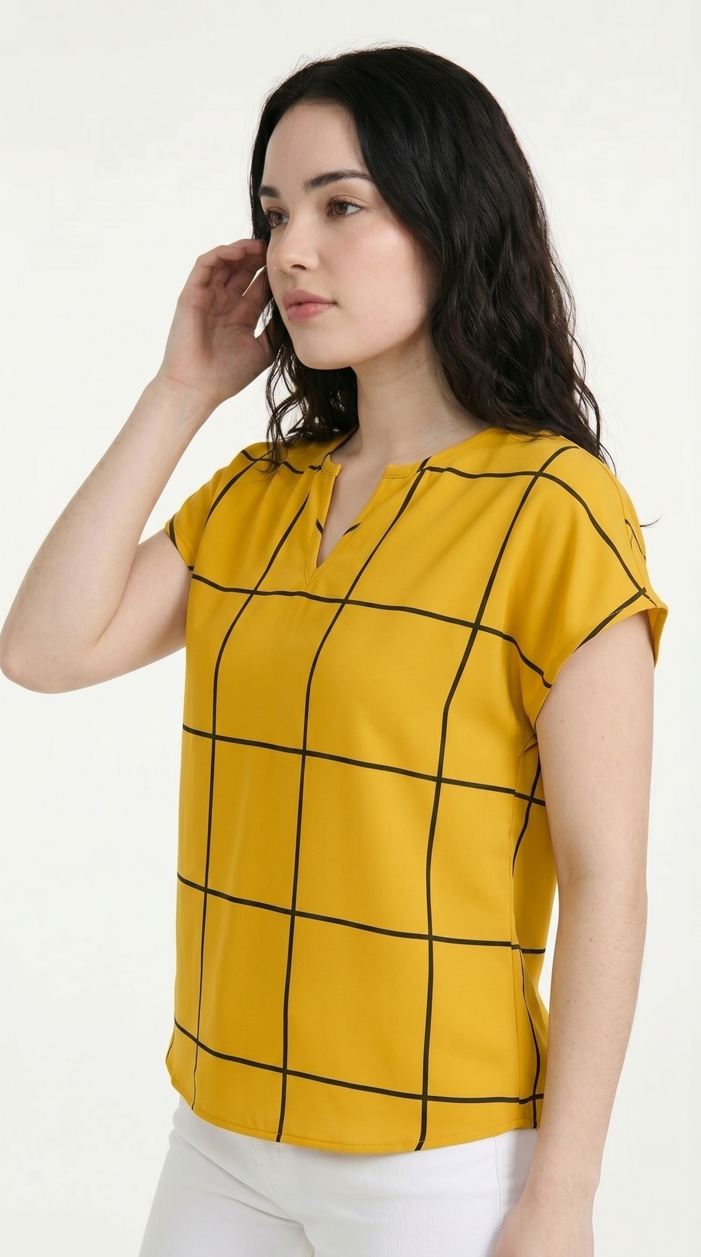 Woman wearing a yellow checkered shirt against a white background, from Meleche Fashion USA or Meléche (short as (Mé))