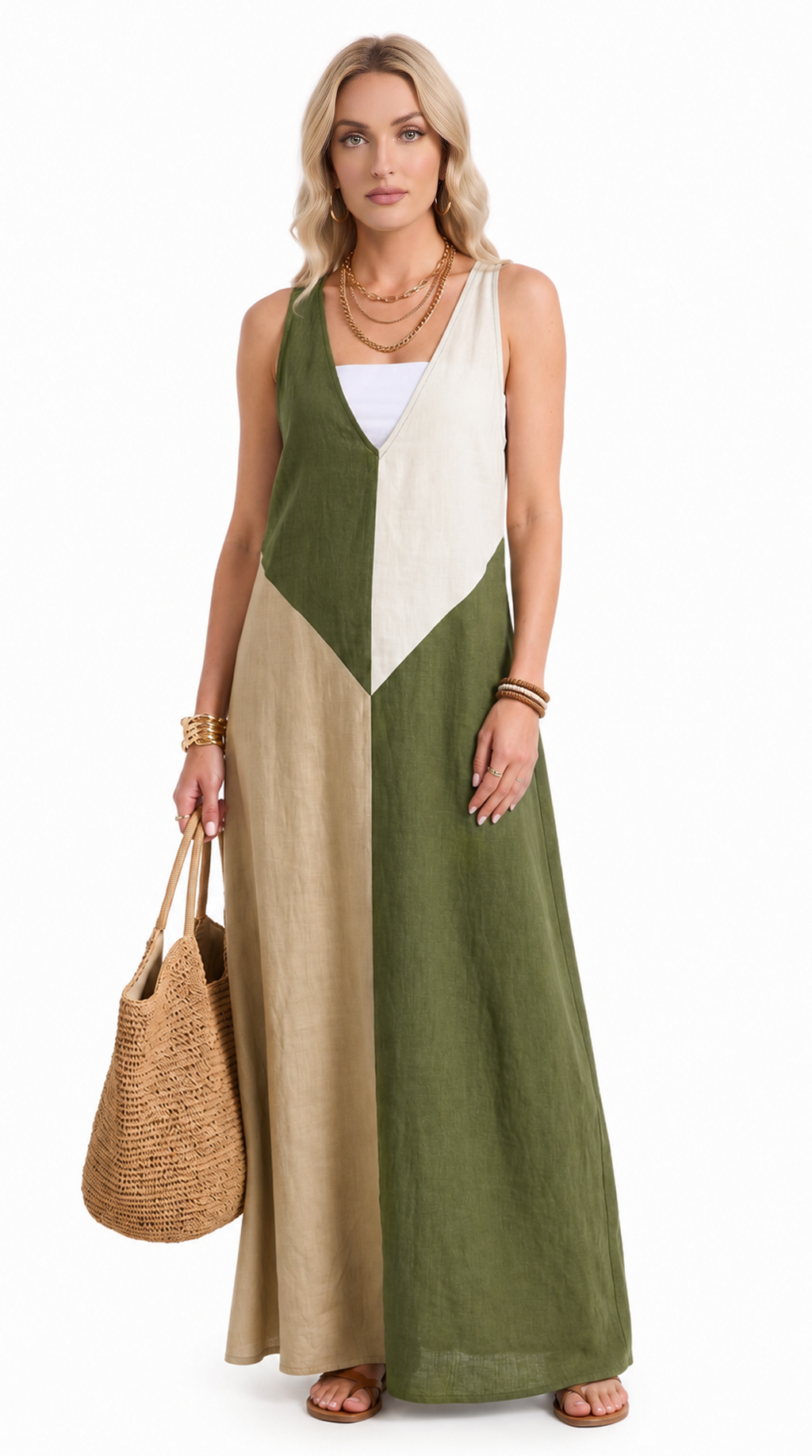 Woman wearing a long, color-blocked dress with a white top, green middle, and beige bottom, holding a woven bag, from Meleche Fashion USA or Meléche (short as (Mé))